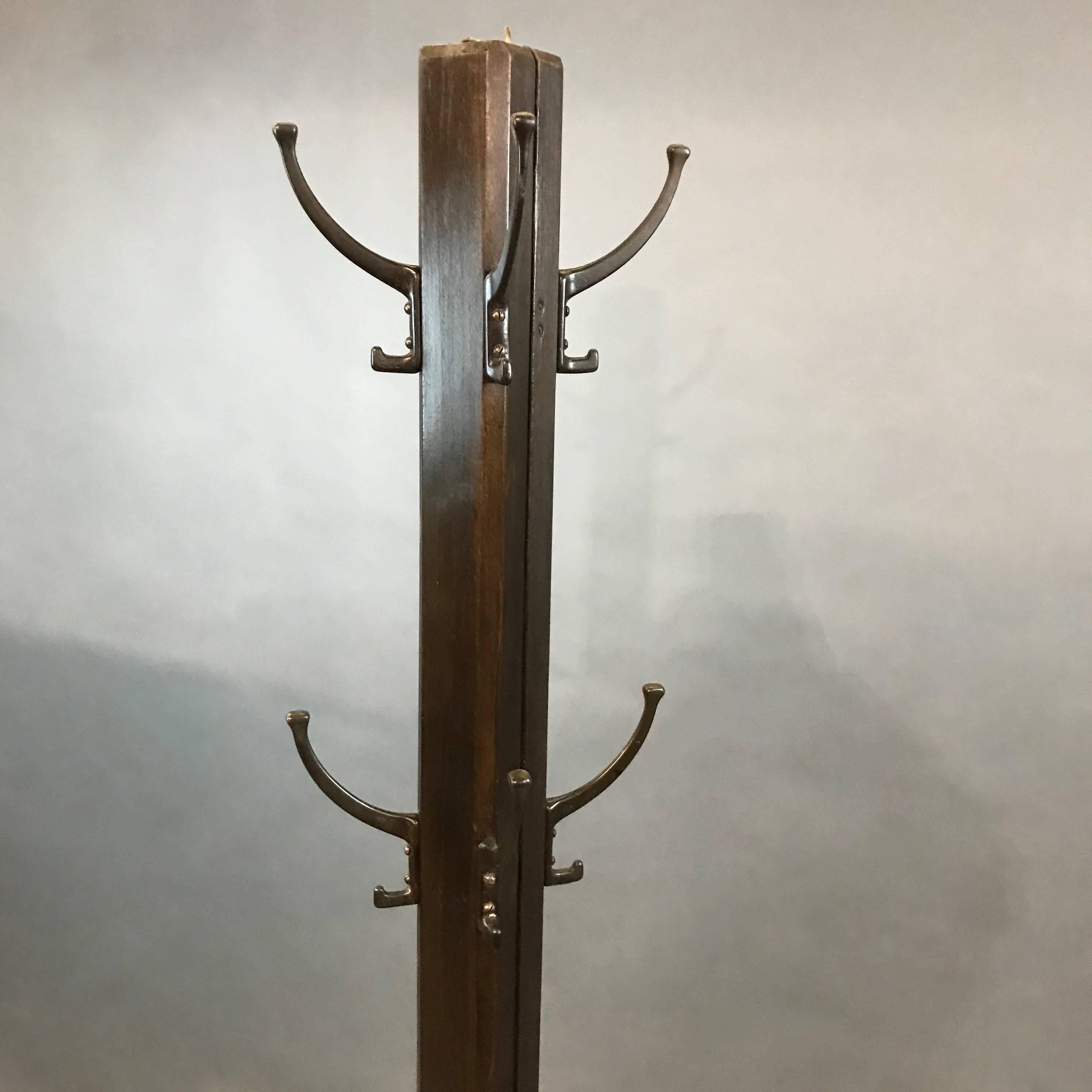 Mid Century Ebonized Poplar And Brass Expandable Coat Rack In Good Condition In Brooklyn, NY