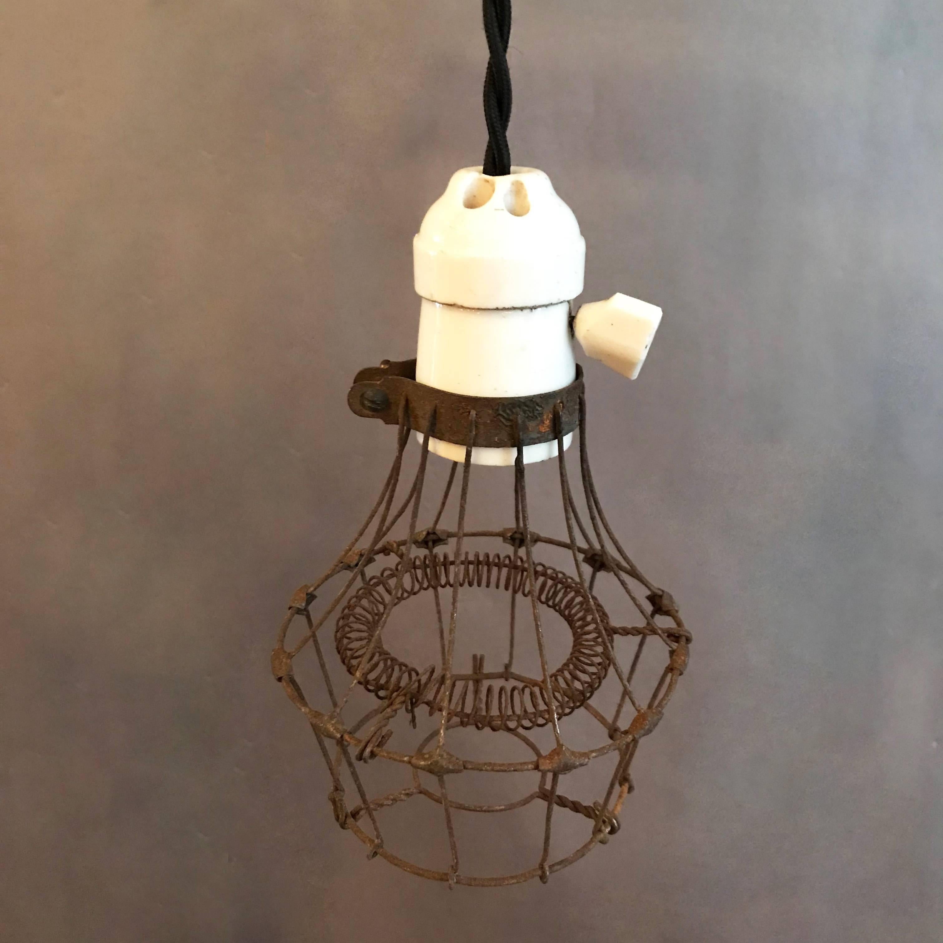 Early 20th Century Industrial Porcelain and Steel Wire Cage Pendant Light