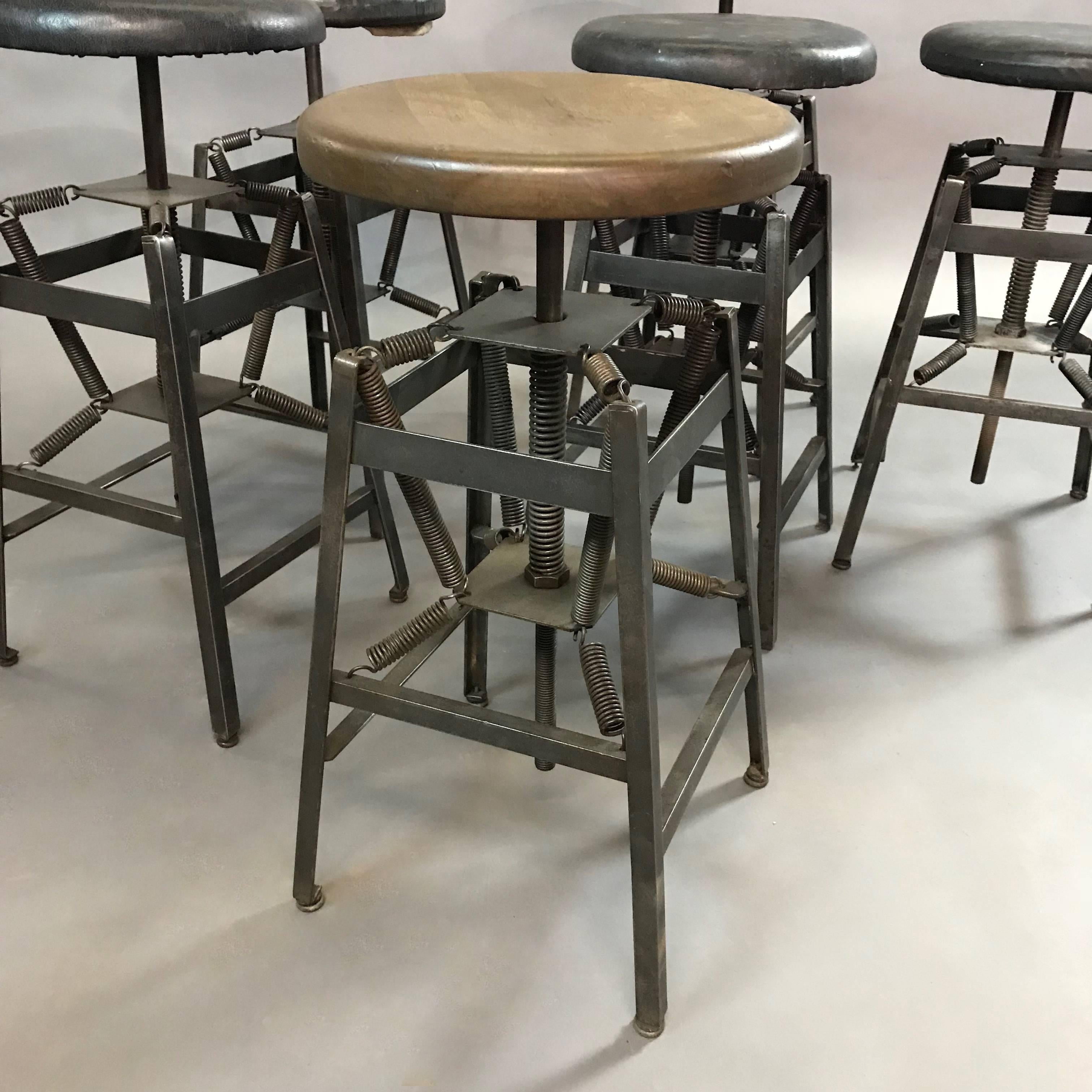 Industrial Adjustable Drafting Spring Stools by American Cabinet Co. In Good Condition For Sale In Brooklyn, NY