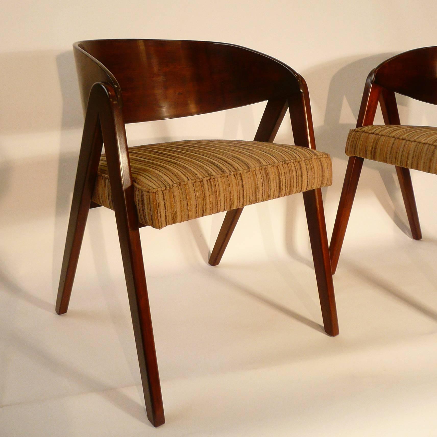 Pair of walnut compass chairs by Allan Gould for Herman Miller are fully restored with textured linen blend seats.
