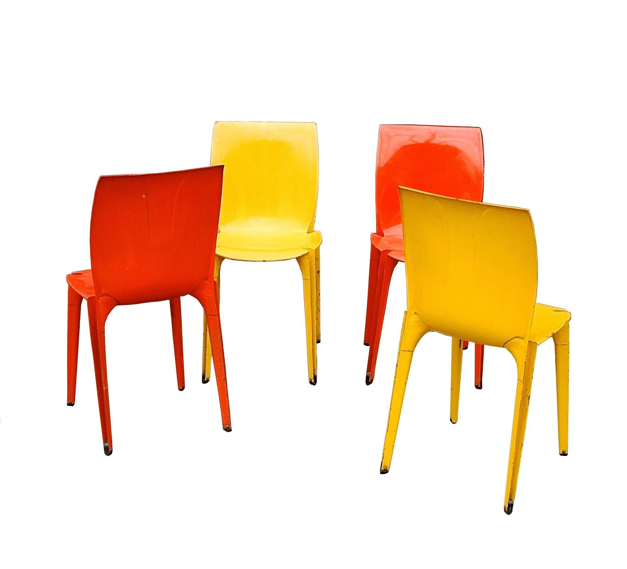 Set of four, limited edition, stamped and enameled metal “Lambda” chairs designed by architect Marco Zanuso for Gavina, Italy.