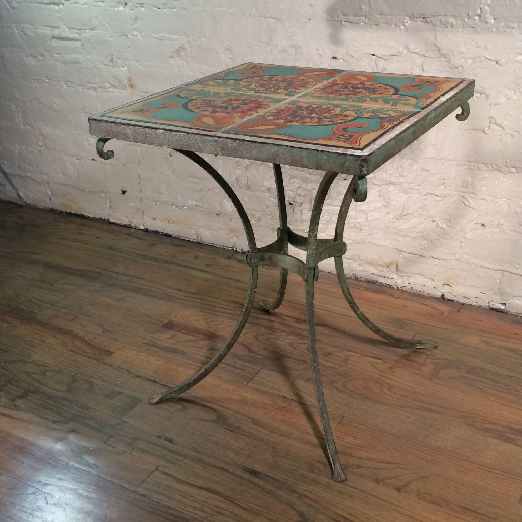 Colorful, ceramic, Arts & Crafts, California tile, side/accent/occasional table with painted wrought iron base. Excellent patina overall.