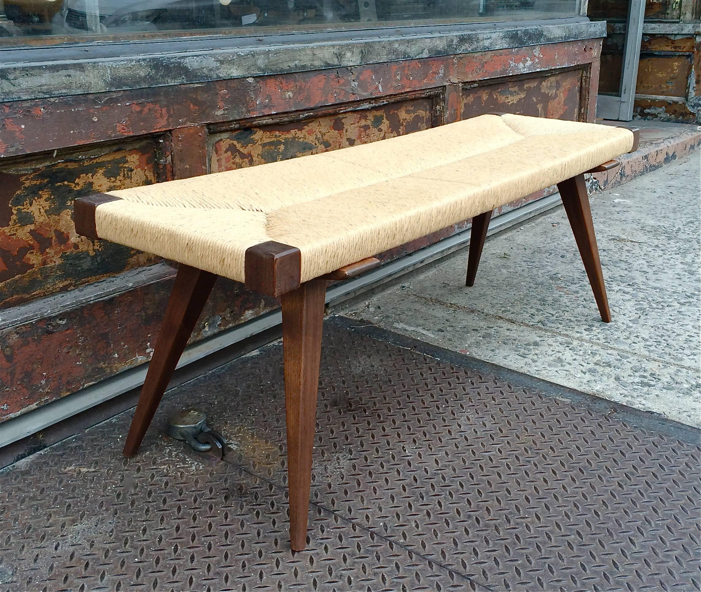 Custom, Mid-Century Modern style bench is walnut and ash wood with woven rush seat, made in Brooklyn, NY by City Foundry.