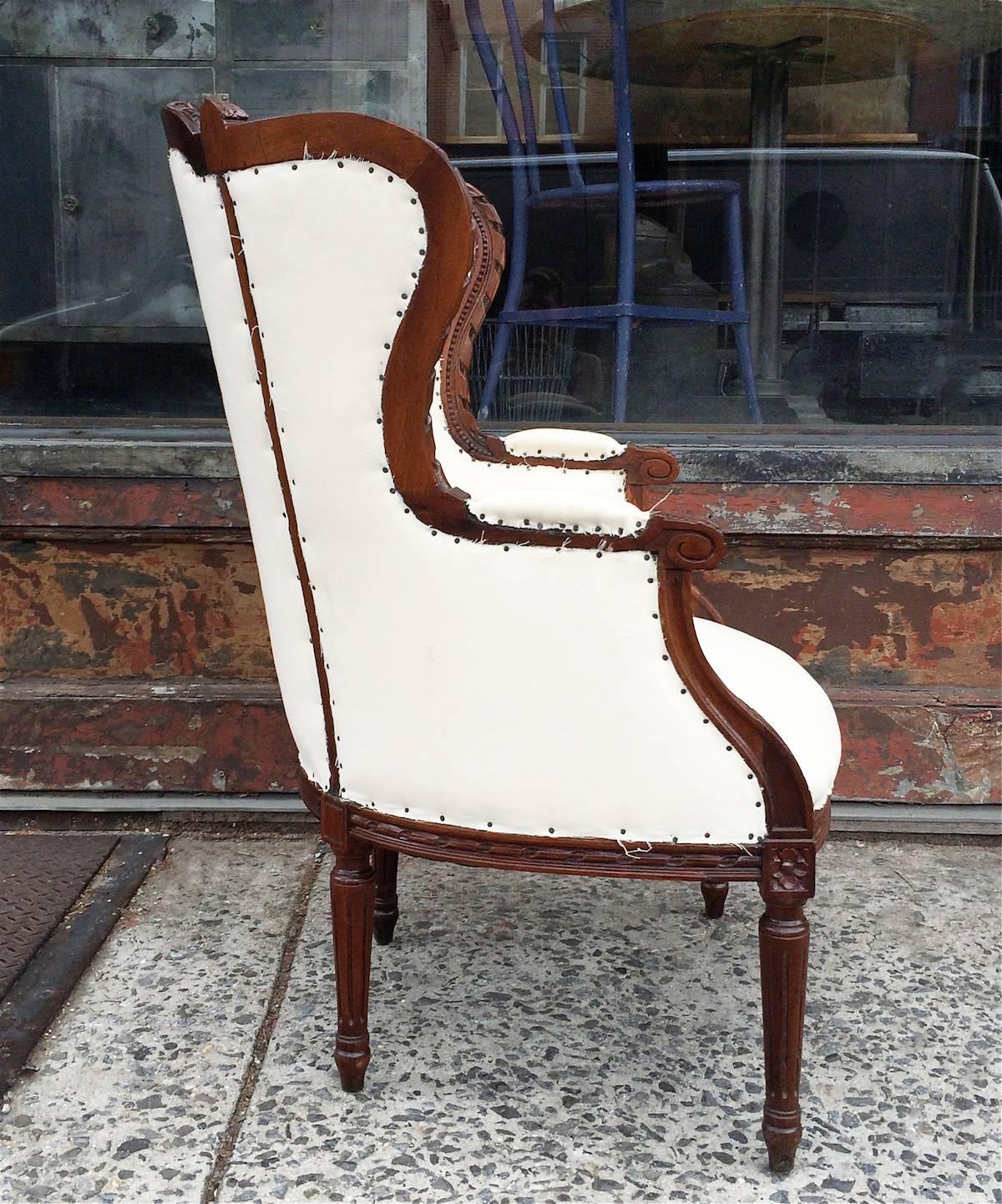 American Carved Mahogany Wingback Armchair