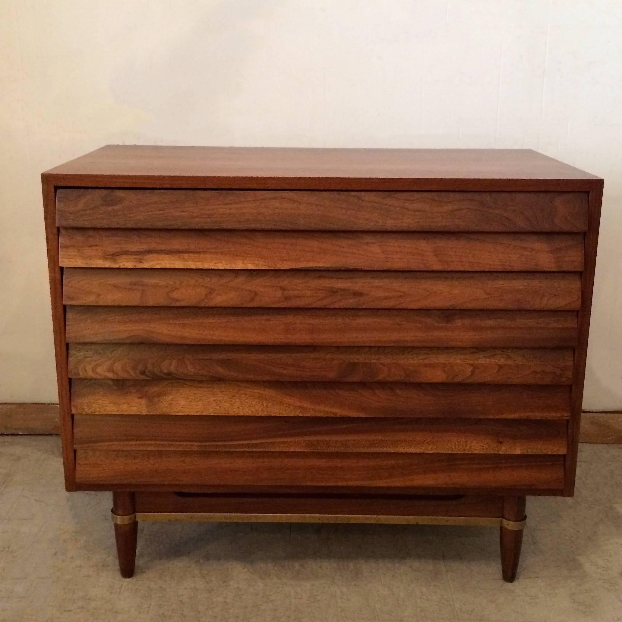 Mid-Century Modern, 3 drawer, walnut dresser with brass accents by Merton Gershon for American’s of Martinsville features a louvered front. The companion American Of Martinsville dresser shown is listed separately. 