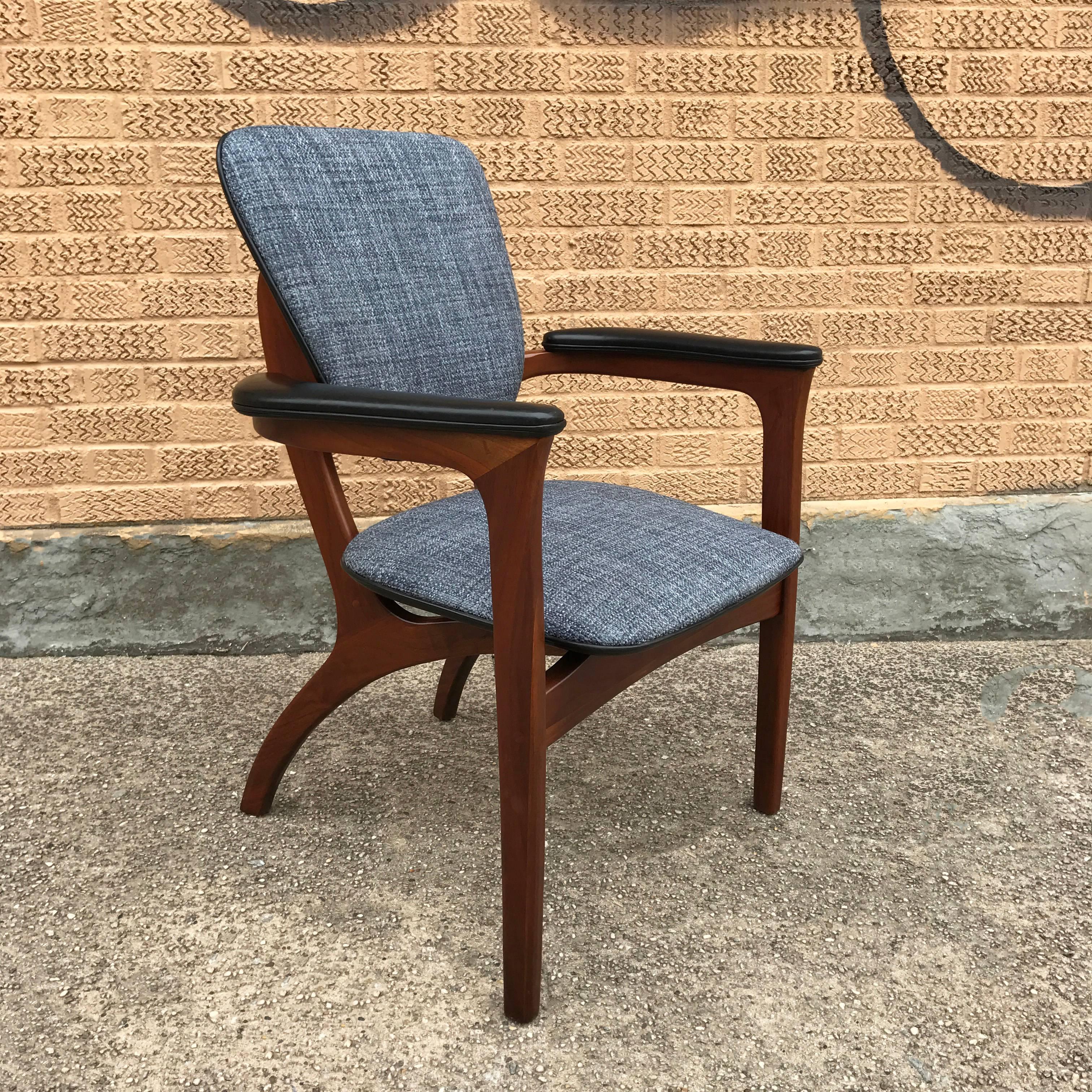 Rare, Mid-Century Modern, sculptural, walnut armchair designed by Adrian Pearsall is fully restored featuring blue tweed upholstered seat and back with black leather armrests. A handsome chair from all angles.