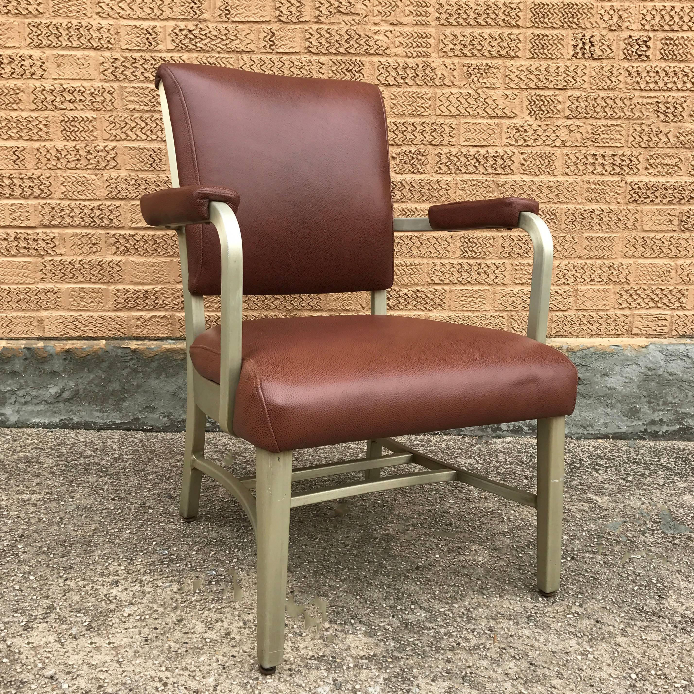 Industrial, mid century armchair by GoodForm, The General Fireproofing Co. with aluminum frame is newly upholstered in deep cognac brown luggage leather.