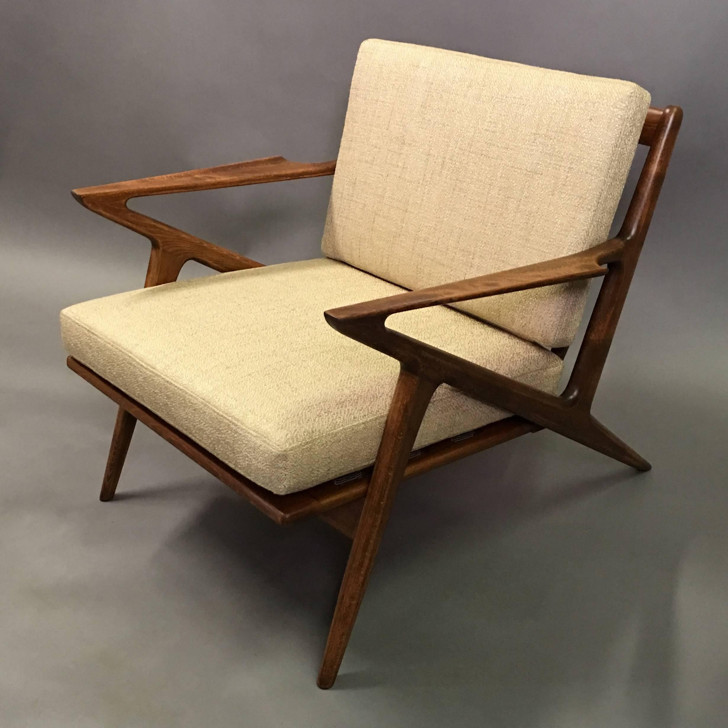 Classic, Danish Modern, slat-back, Z lounge chair designed by Poul Jensen for Selig has a newly refinished birch frame and oatmeal cotton blend upholstered seat and back. We have second teak Z chair as shown to make a pair that is listed separately.