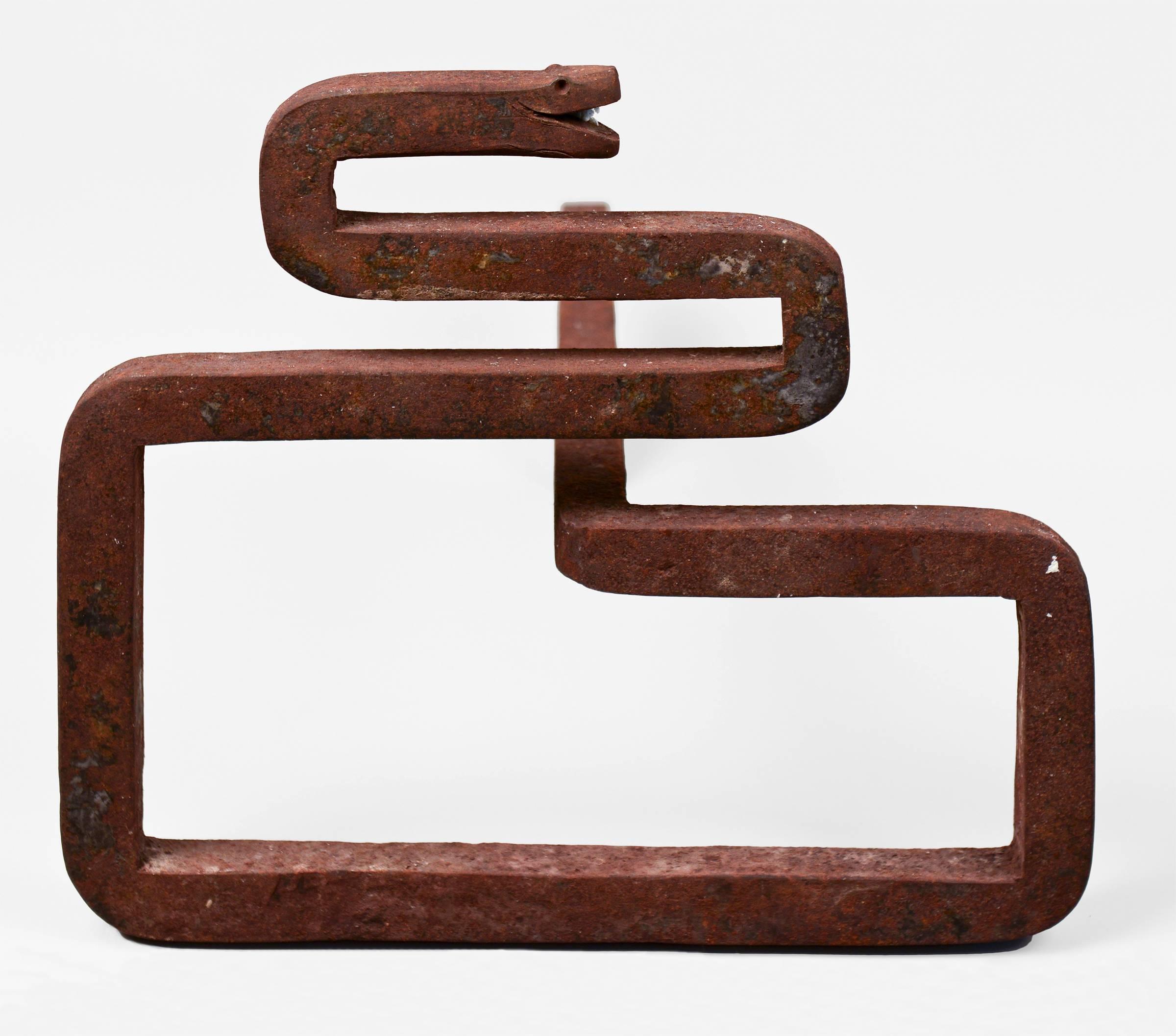 Unusual pair of iron snake andirons. A similar pair is published in Ricco Maresca, American Primitive, circa 1920.