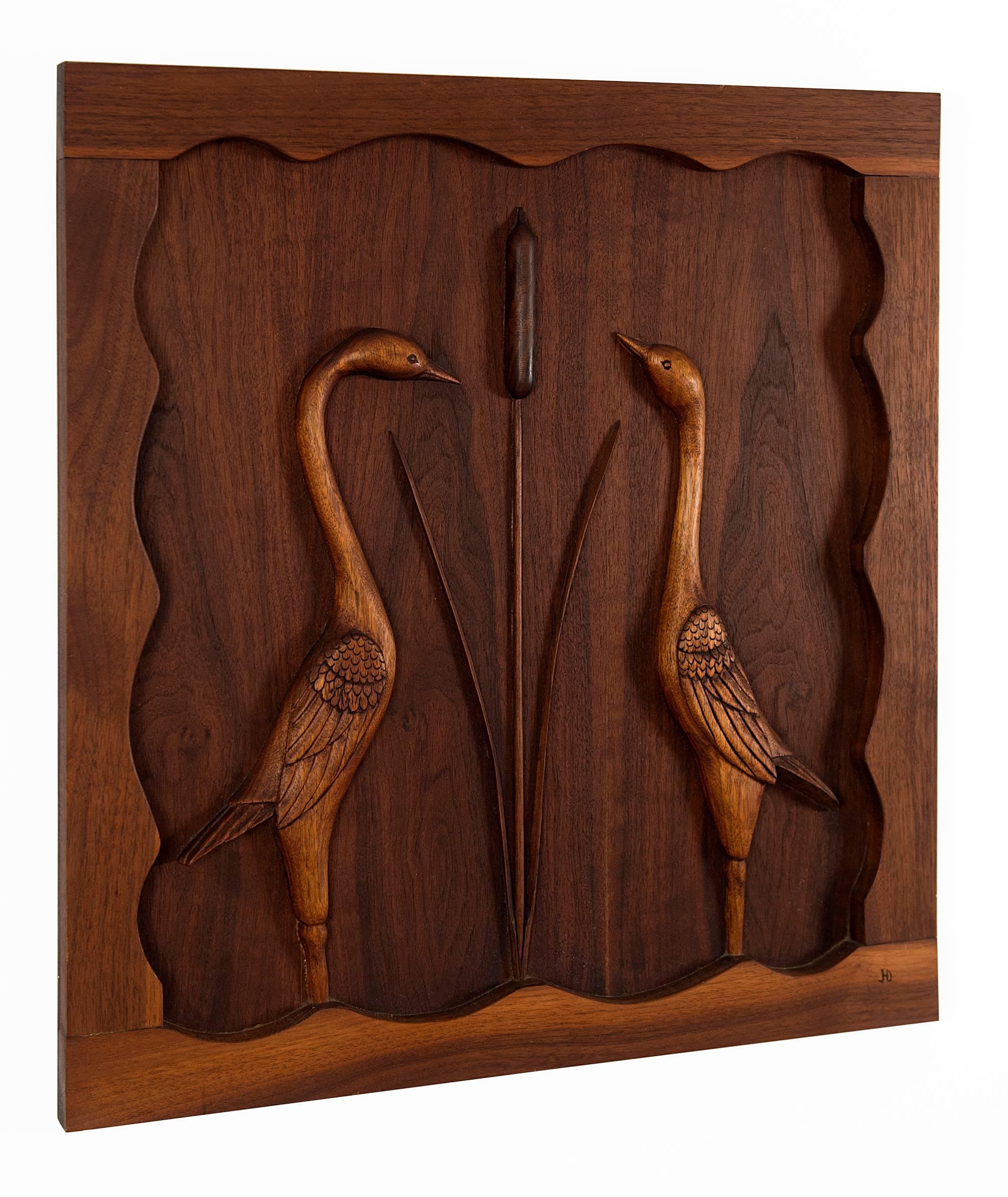 Beautifully done carved walnut panel with egrets and cattails.
 