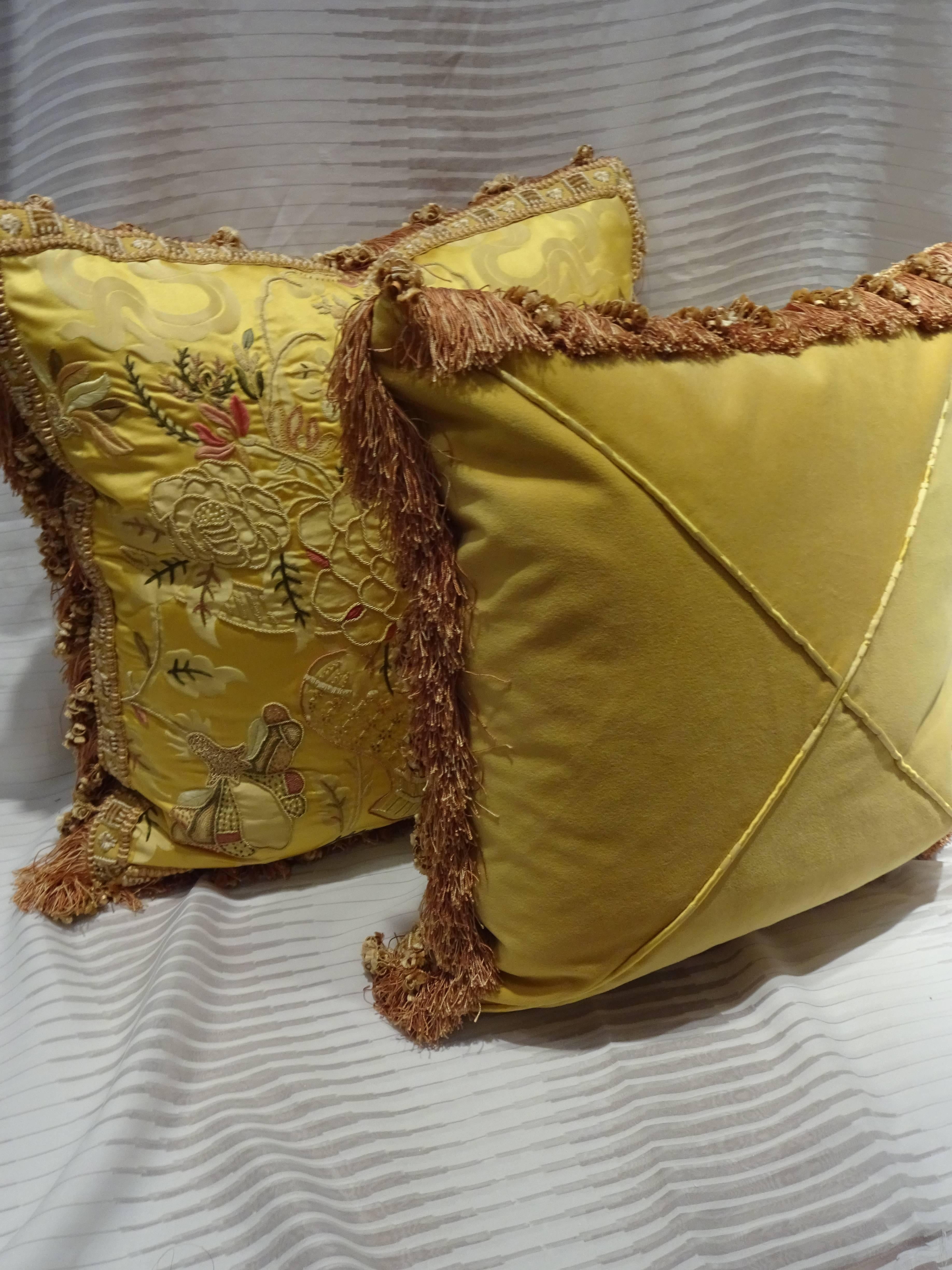 Luxurious embroidered pillows, new bright yellow.
Scalamandre fabric front.
Plain velvet fabric back with damask fabric welt.
Rich gimp and tassel fringe.
Size 20
