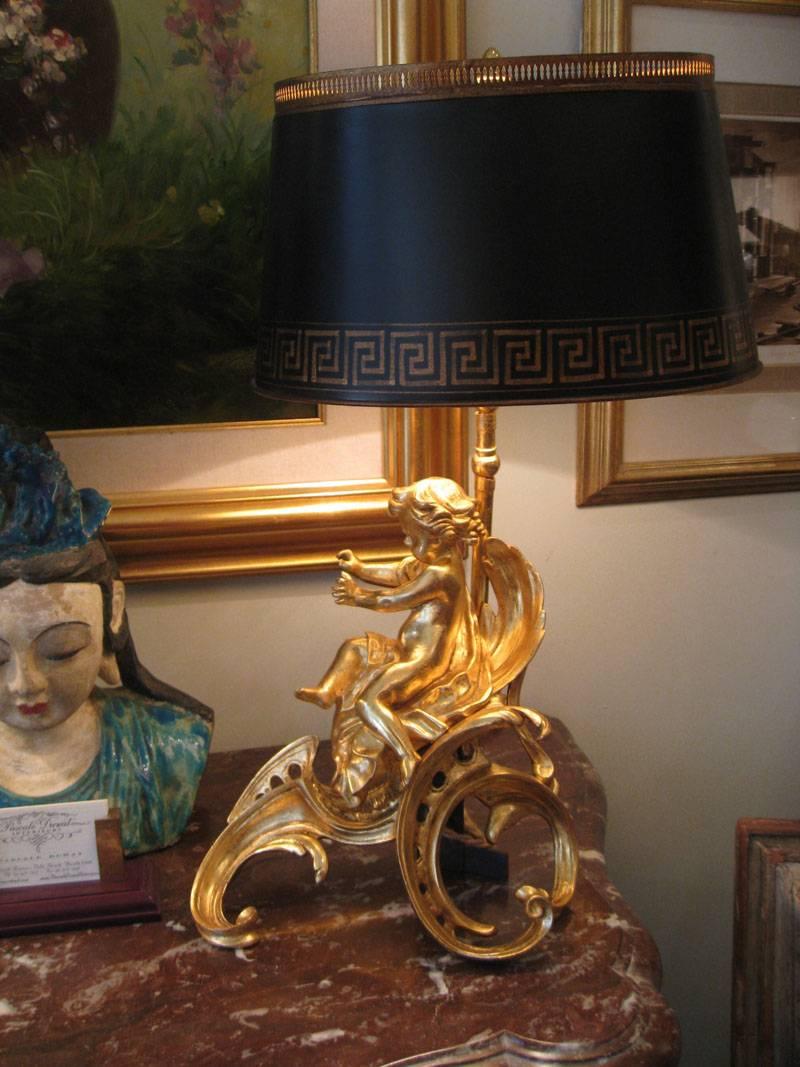 Pair of 18th century French chenets transformed into table lamps,
18th century, Louis XV period.
Tole black painted lampshades (new).
Beautiful gilt 