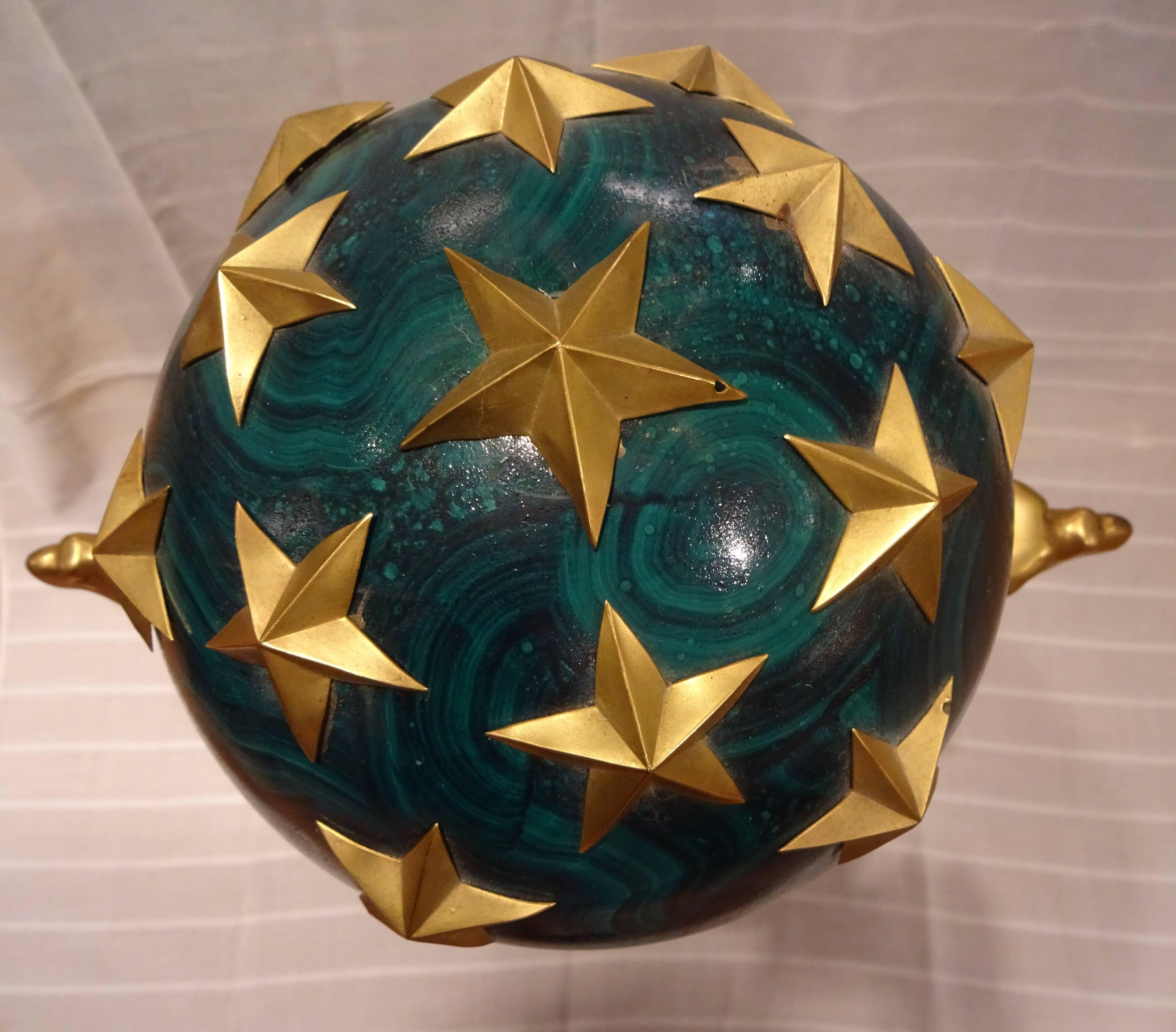 Exceptional gilt bronze French chenets
Representing pair of eagles holding a sphere embellished by gilt stars
Sphere painted in Malachite finish
In the style of Pierre Philippe Thomire 