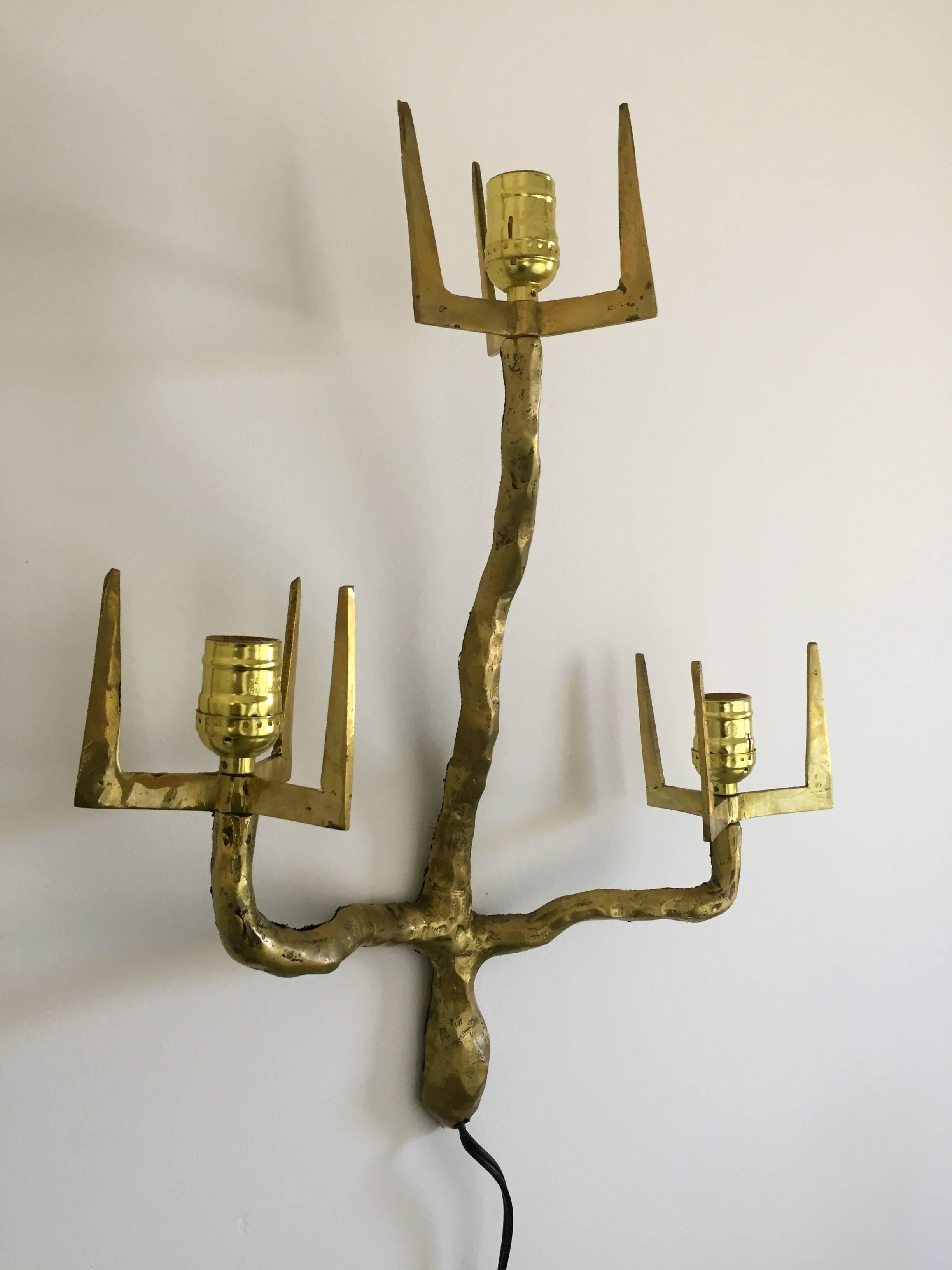 Outstanding and dramatic pair of Brutalist bronze sconces attributed to Maison Arlus in the manner of Felix Agostini, 1960s.