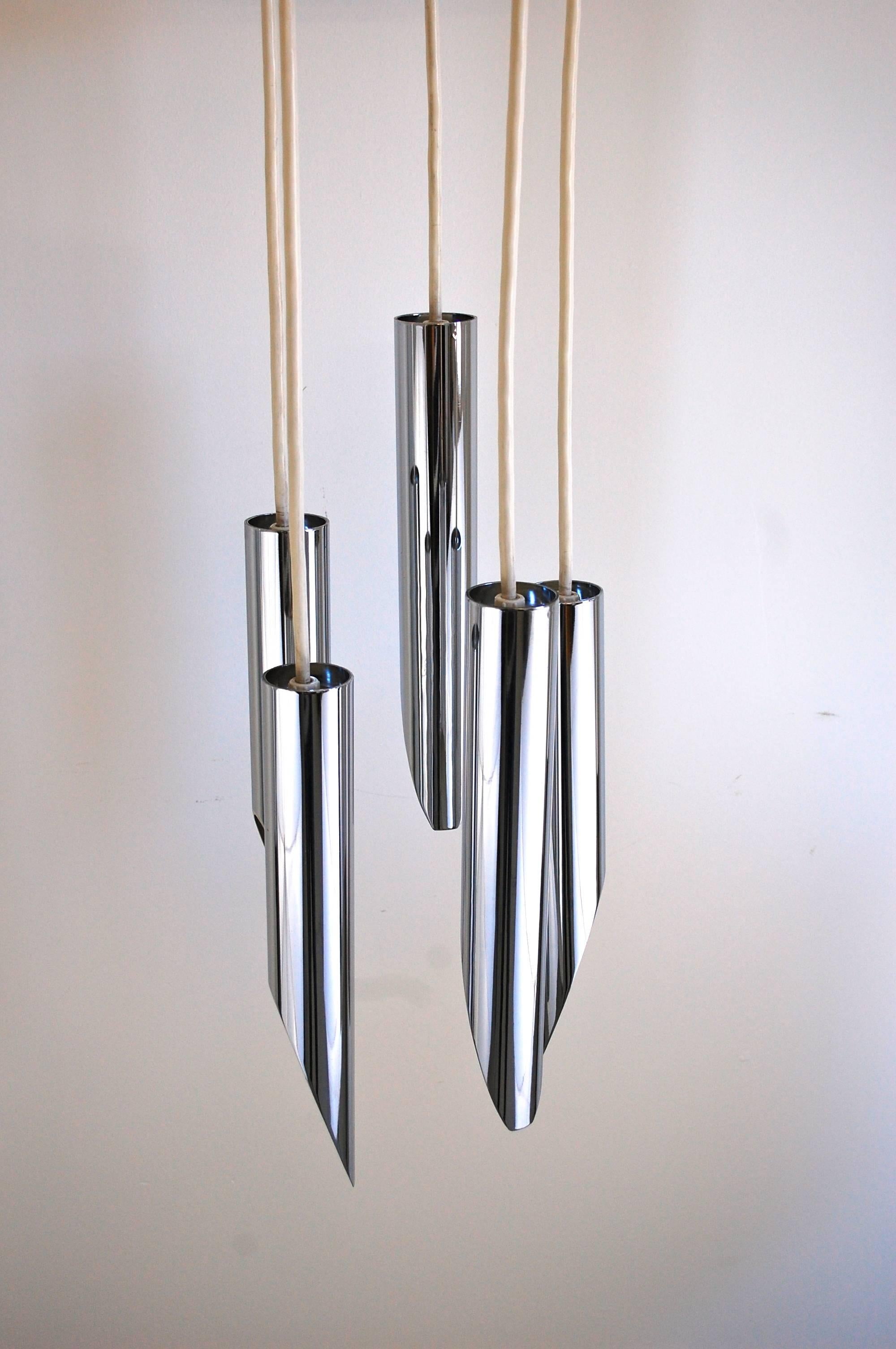 Stunning chandelier with five heavy chrome pendant lights by Robert Sonneman, 1970s. The drops of each pendant are adjustable, allowing for a variety of height options.