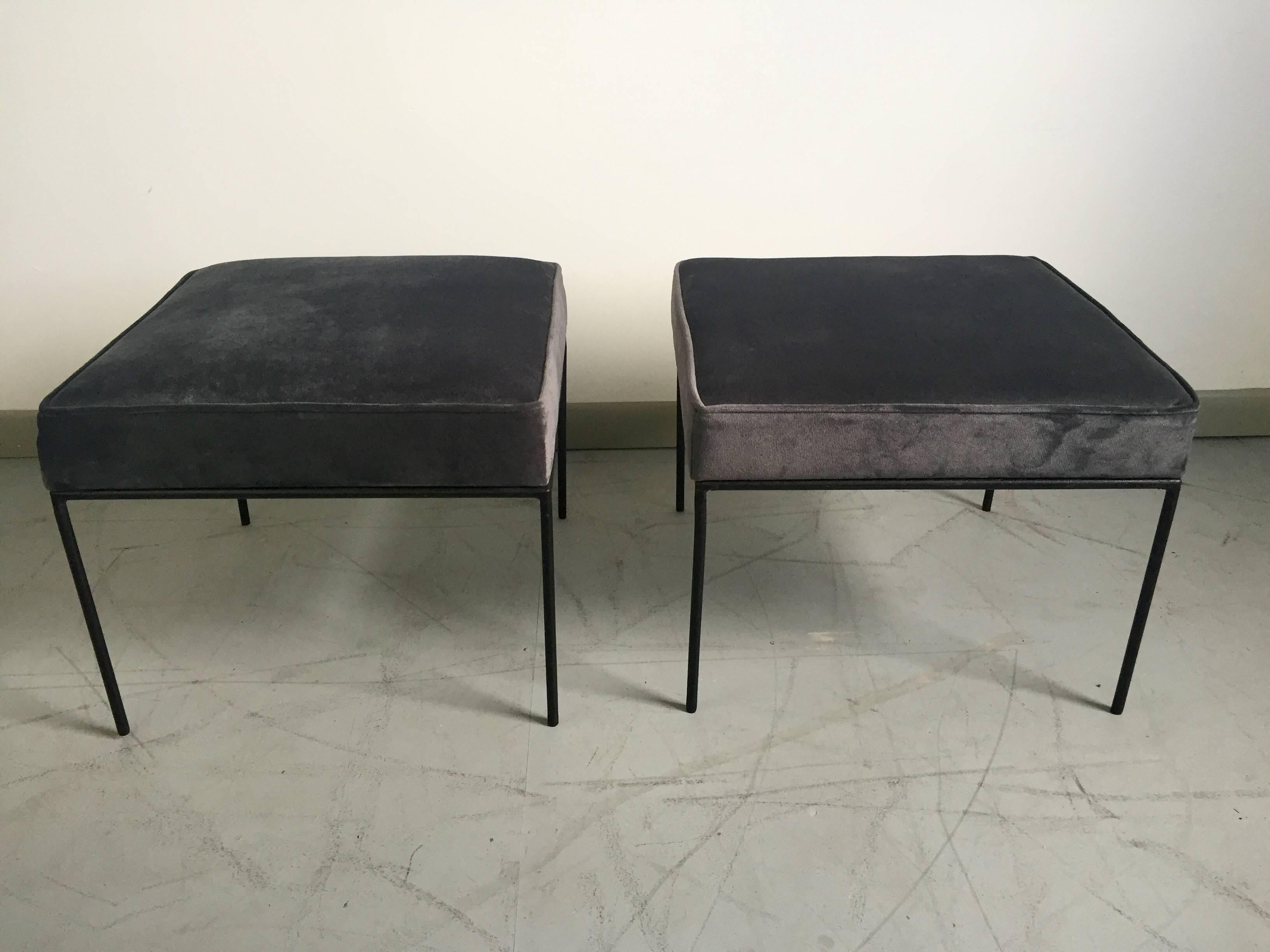Classic square stools by Paul McCobb featuring iron bases and newly upholstered seats in a rich steel grey velvet.