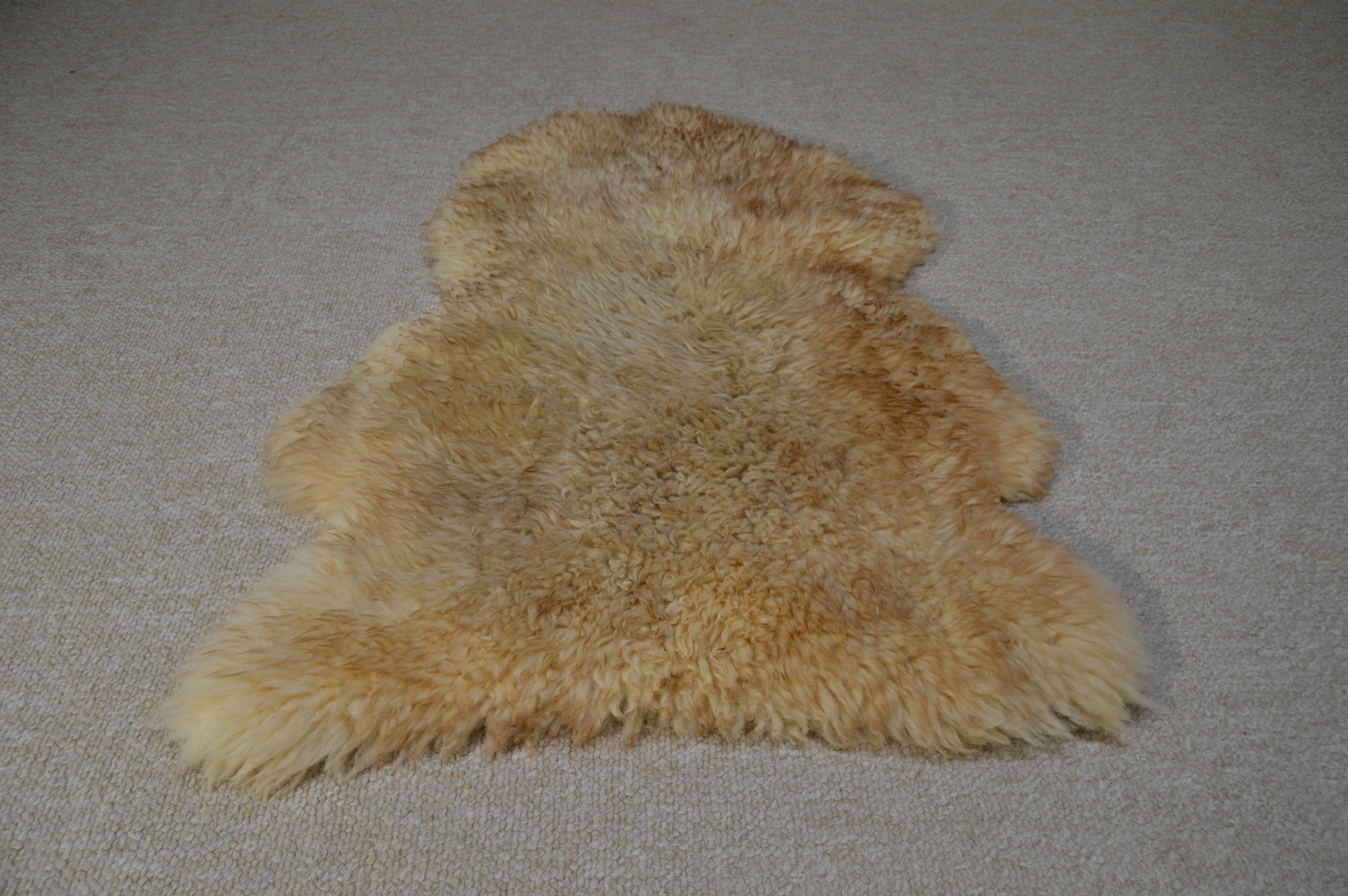 A beautiful, plush and very clean sheepskin throw. Well maintained and hardly used at all. Gorgeous original color.
Thickness: 3".
