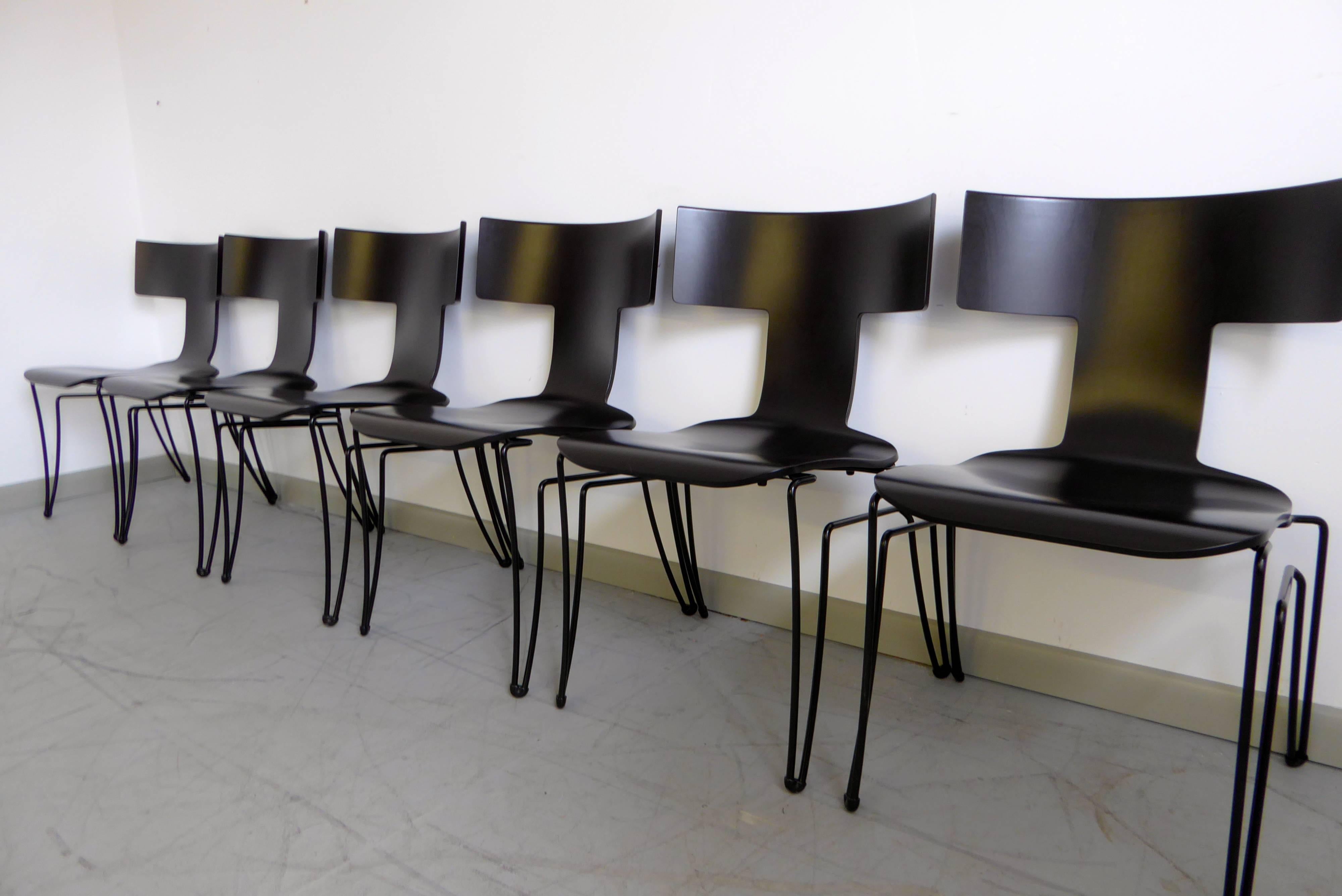 Set of six Anziano chairs by John Hutton for Donghia. Stunning Klismos ebonized molded beechwood shell, powder coated mandrel steel base.