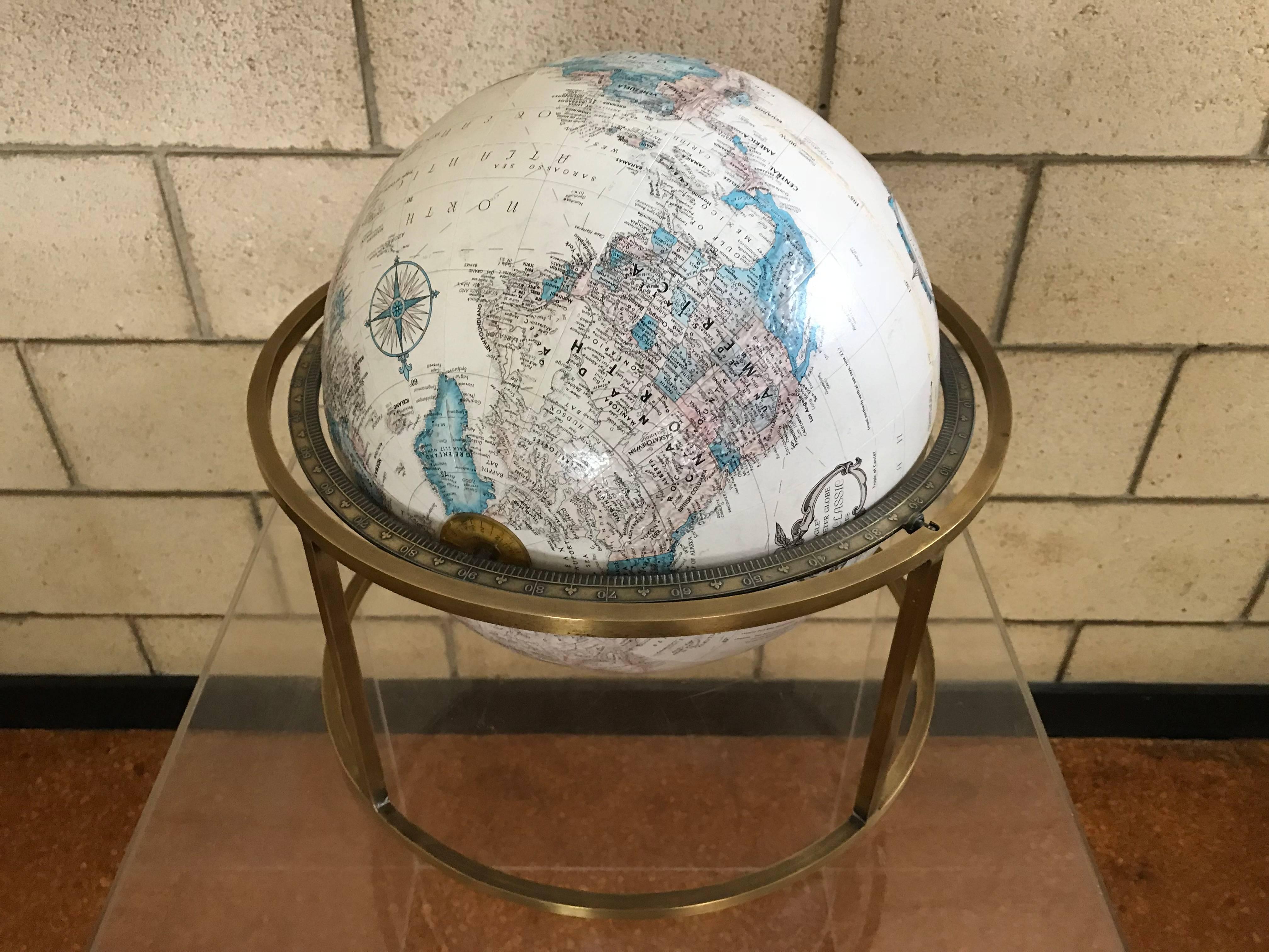 Modernist desk globe in the style of Paul McCobb (McCobb actually never designed globes - but the brass carriage is reminiscent of his furniture designs). this globe dates to 1978. (Solomon Islands no longer British) The brass has been cleaned and