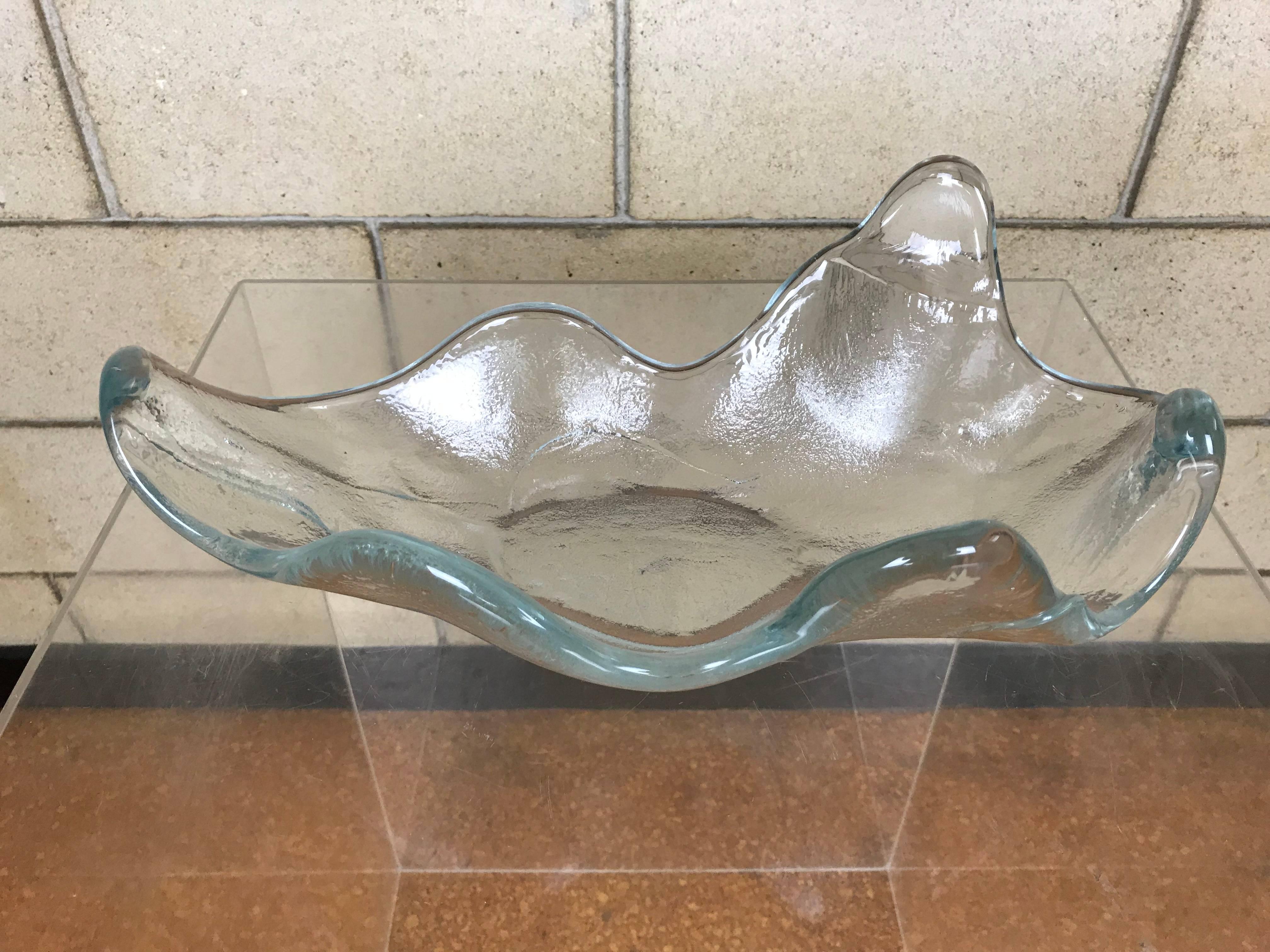 Beautiful large biomorphic handblown abstract thick glass bowl by Blenko, circa 1965. The bowl is in excellent condition with no chips or cracks. Underneath you can see the pontil mark. All lines you see are meant to be there, and are undulations in