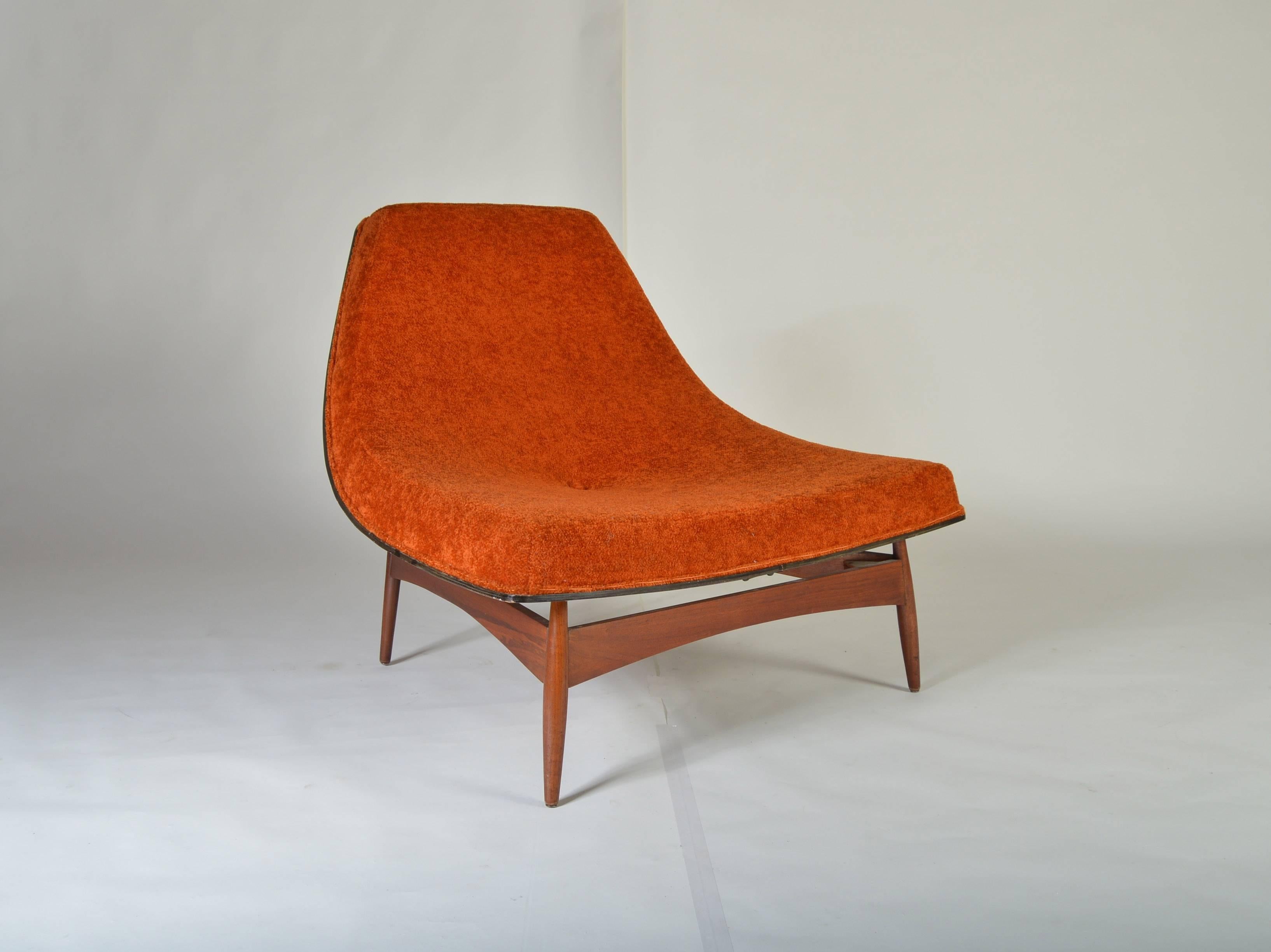 An early, pre-steel frame first edition of the chair that inspired George Nelson's "Coconut Chair." A. J. Donahue designed this chair in the late 1940s. George Nelson, having attended a design expo in Canada was inspired by this design and