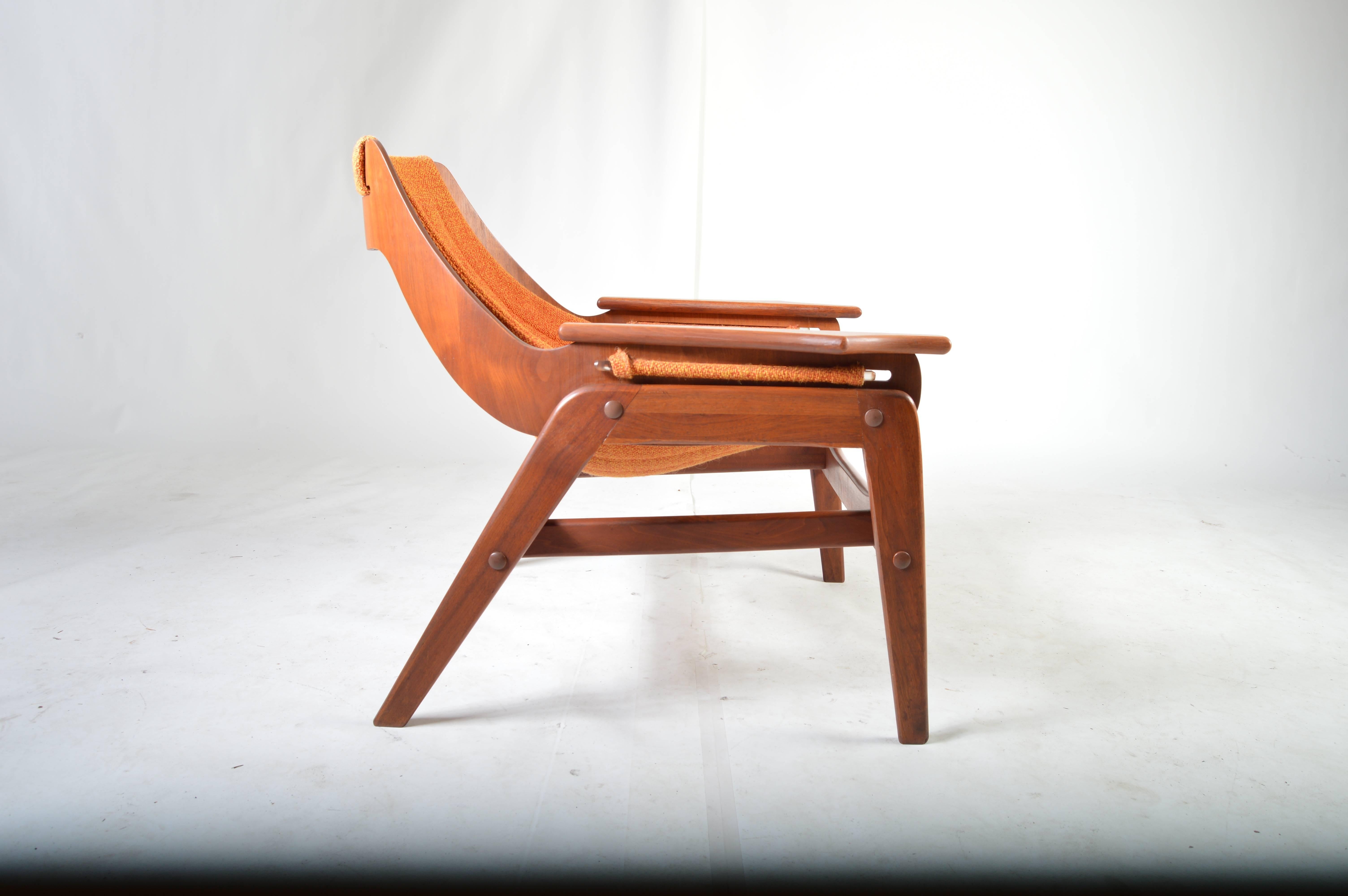 A very cool classic bentwood design having sculptural walnut frame and thick, durable tweed sling. Very comfortable. 