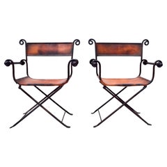 A Pair of Italian Savonarola Iron & Leather Campaign Chairs