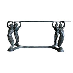 Tavolo da pranzo italiano in bronzo con cariatidi e atlanti e piano in vetro