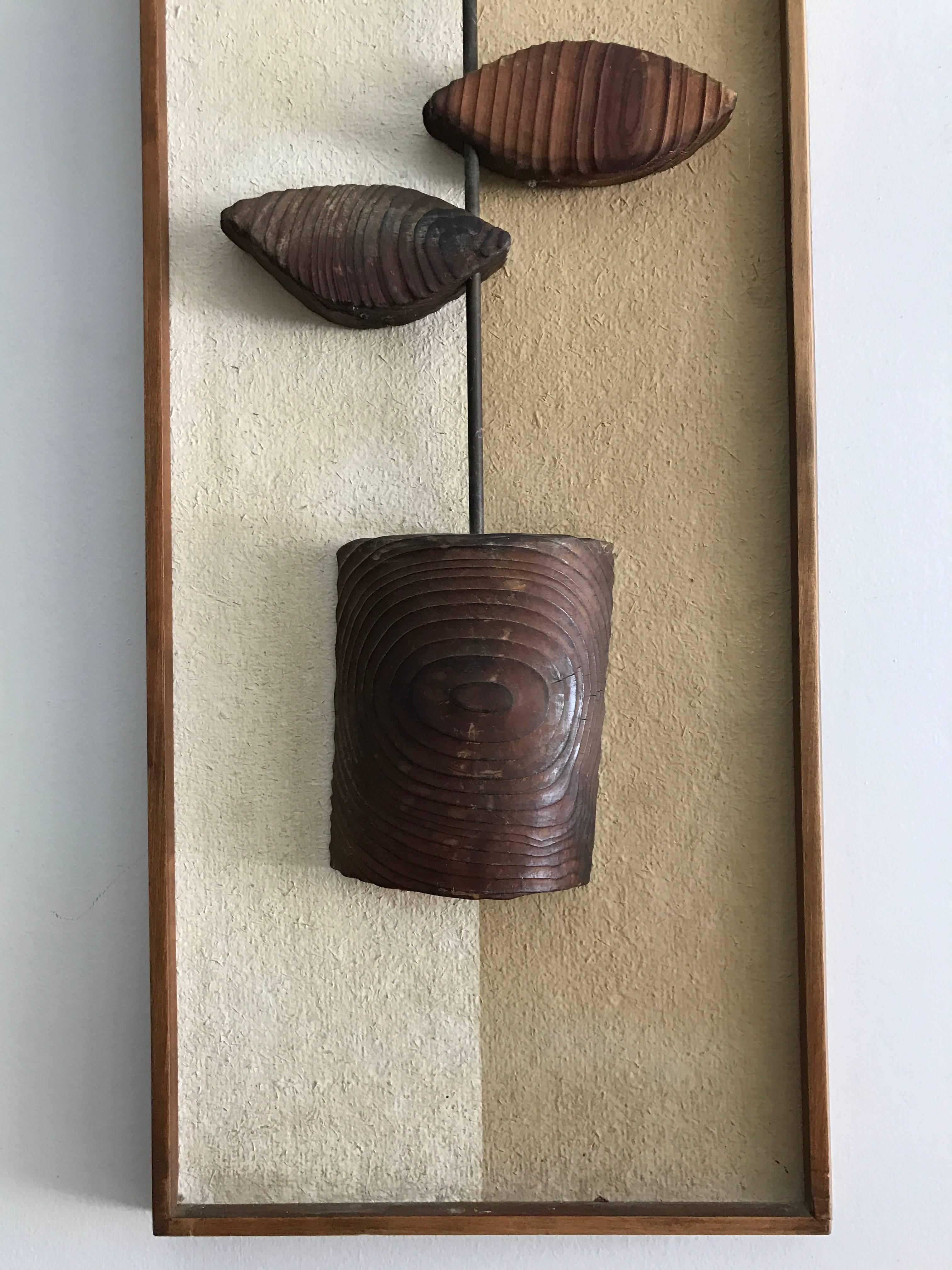 Beautiful three dimensional wood over fabric abstract wall art by Witco, circa 1960

Measures: 48 1/2" tall x 12.25" wide 3" deep.