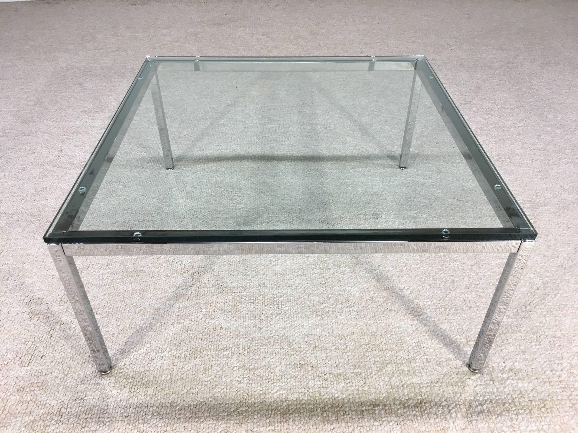 Classic design by Florence Knoll having 1/2" thick glass top with chromed steel frame.