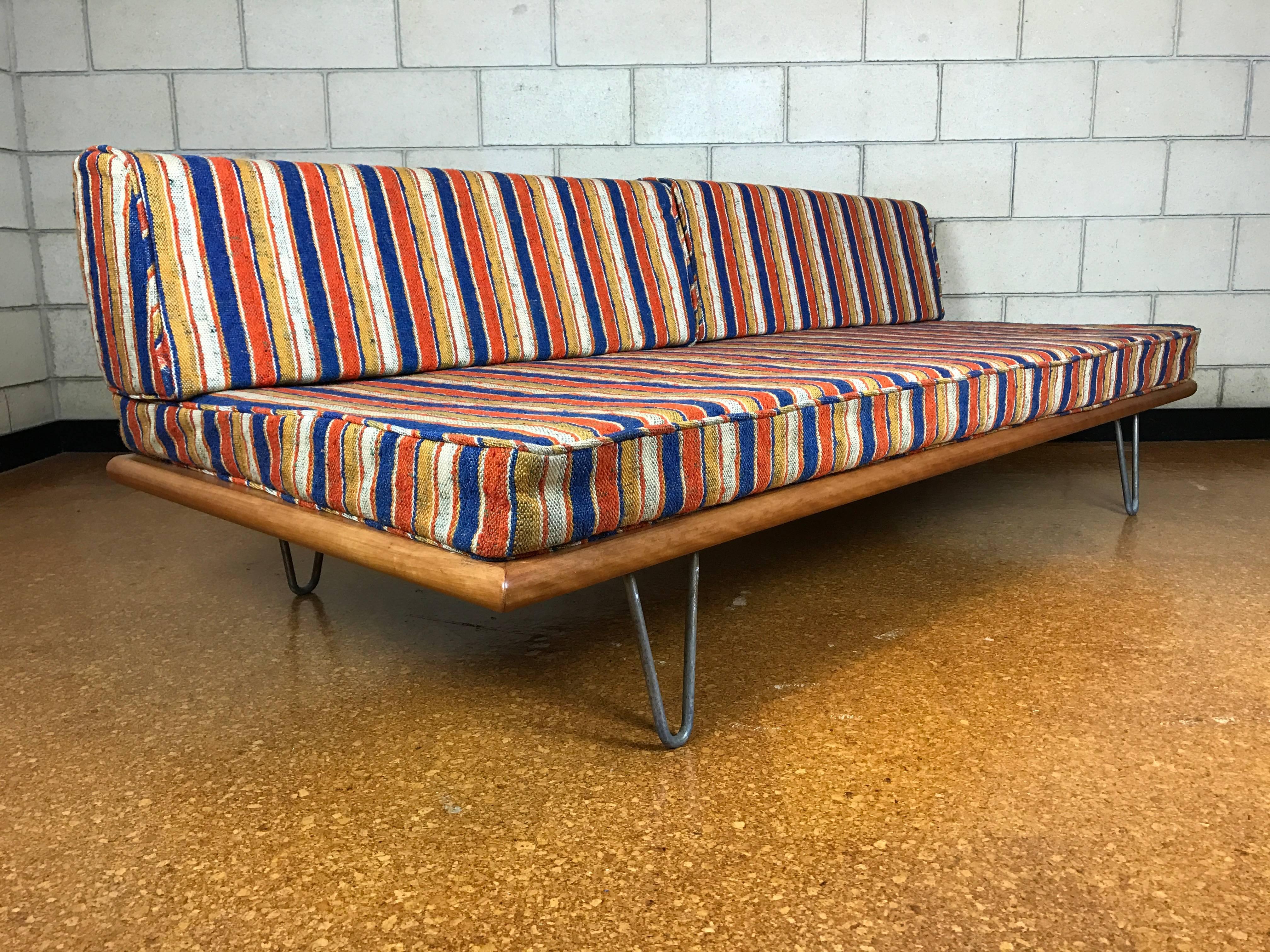 George Nelson for Herman Miller early daybed sofa with original Alexander Girard fabric.
Restored frame. Legs show age appropriate wear. Fabric is excellent. 

Measures: 75" wide x 33" deep x 27" tall. Seat height 15".