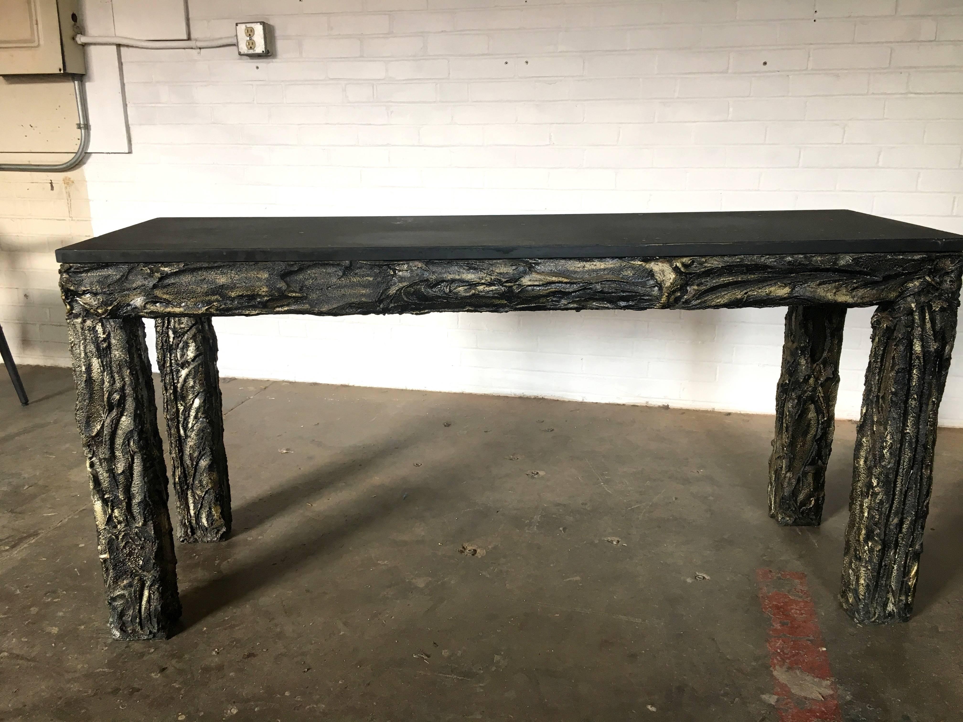 Incredible, never seen anything like it, Brutalist console table in the style of Paul Evans.
The resin is a mixture of gold and black and is just absolutely stunning! Can find no missing resin anywhere.
The original slate top is in great condition