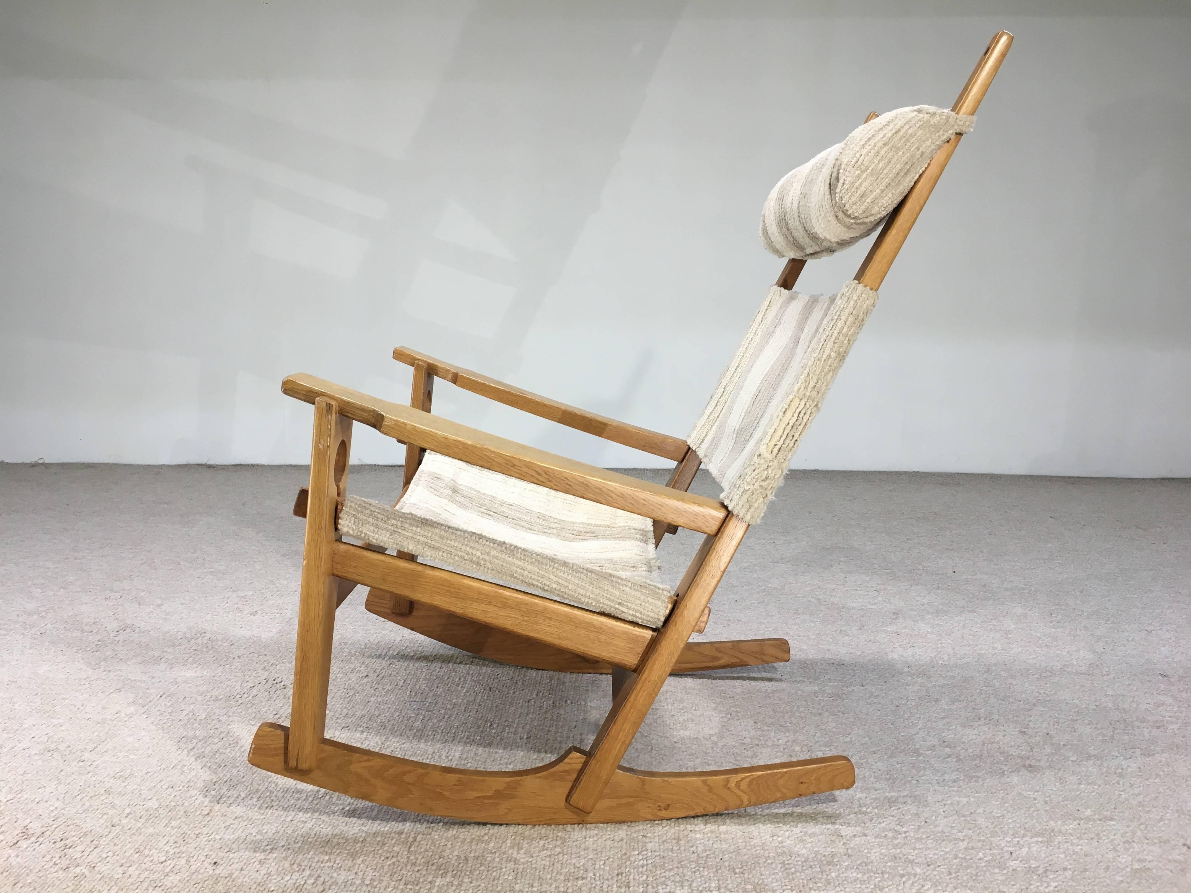 A beautifully designed and very comfortable oak rocking chair designed by Hans J Wegner for GETAMA aptly named the 