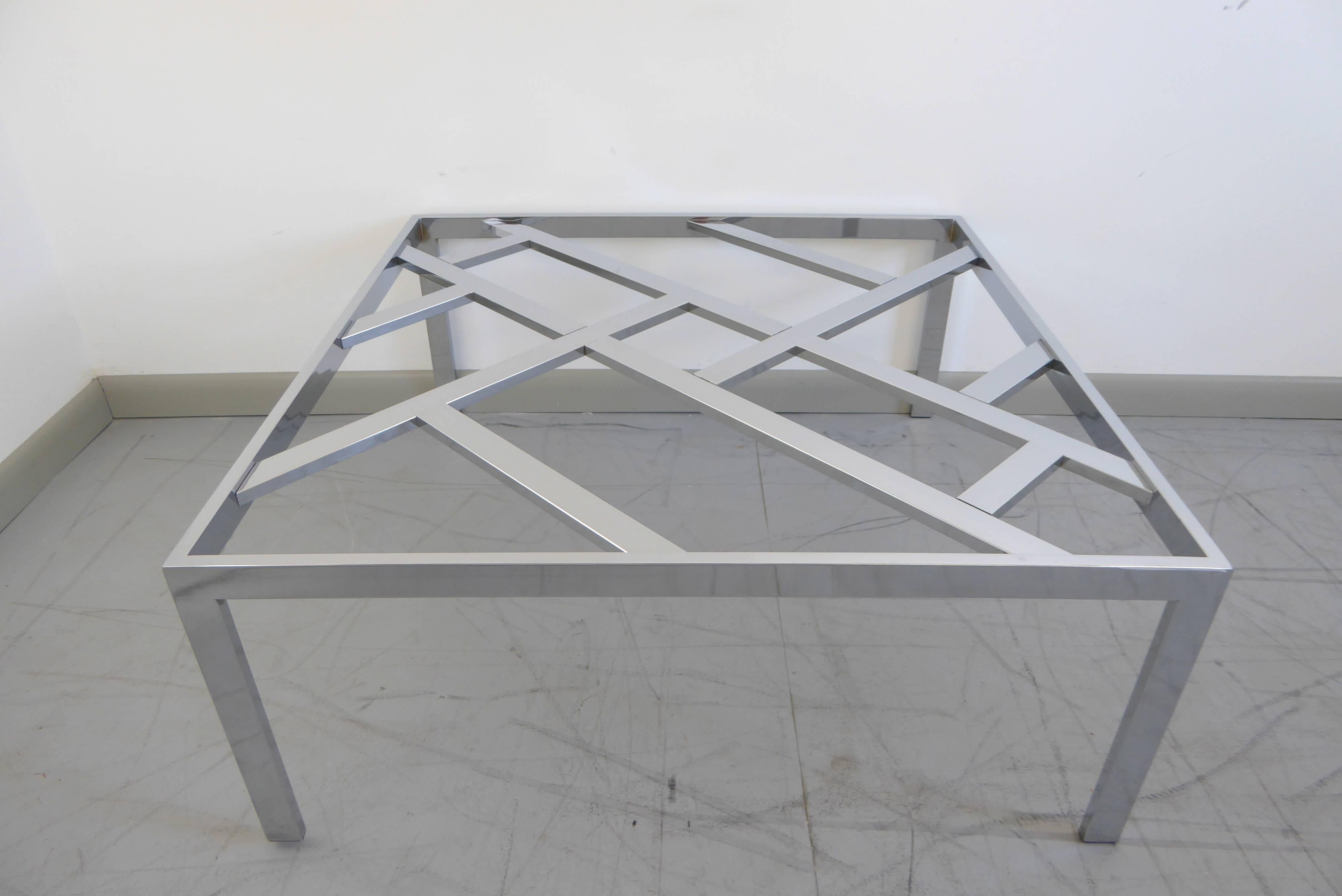 Chrome and glass cocktail table by Milo Baughman for DIA, 1970s. Gleaming chrome and stunning design.