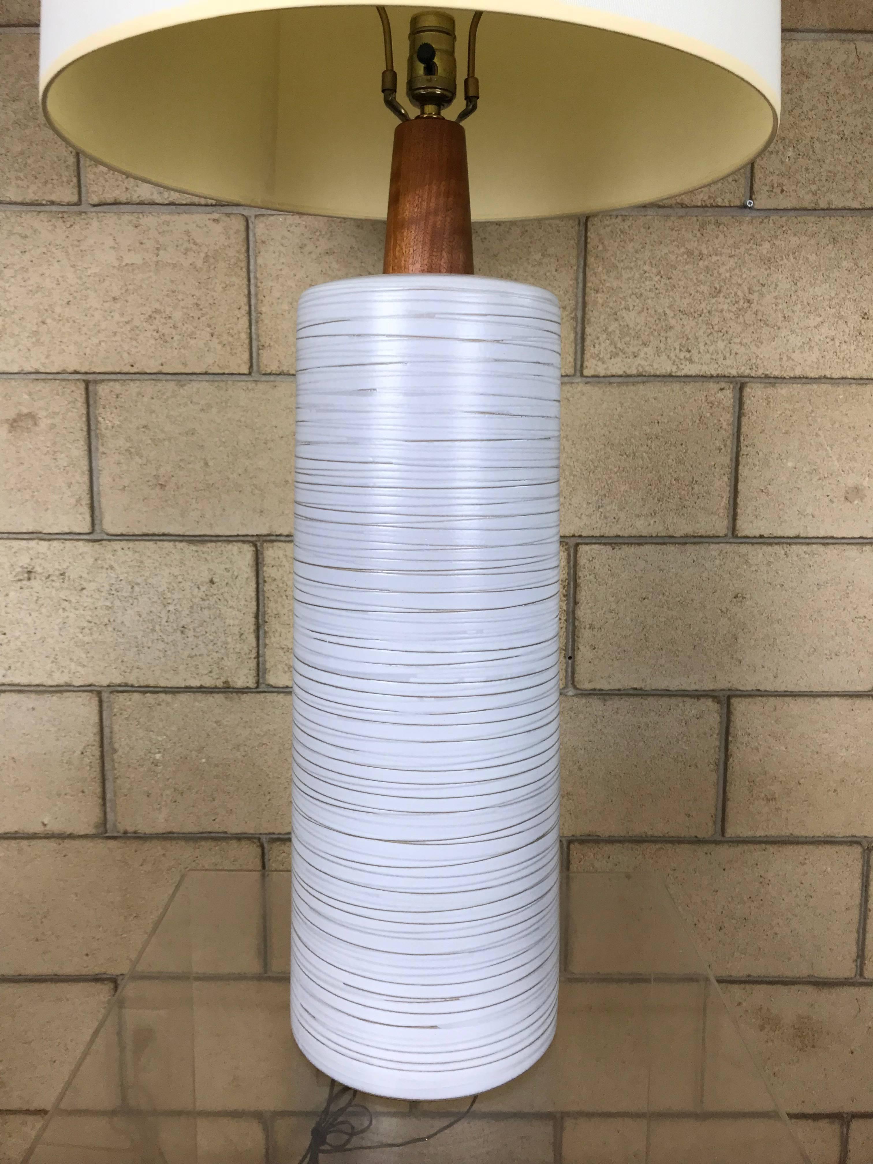 Monumental ceramic studio-made ceramic and teak lamp designed by Jane & Gordon Martz for Marshall Studios, circa 1965. Original teak finial is present. The lamp base is signed. No chips or cracks - it is pristine. I believe this is the original