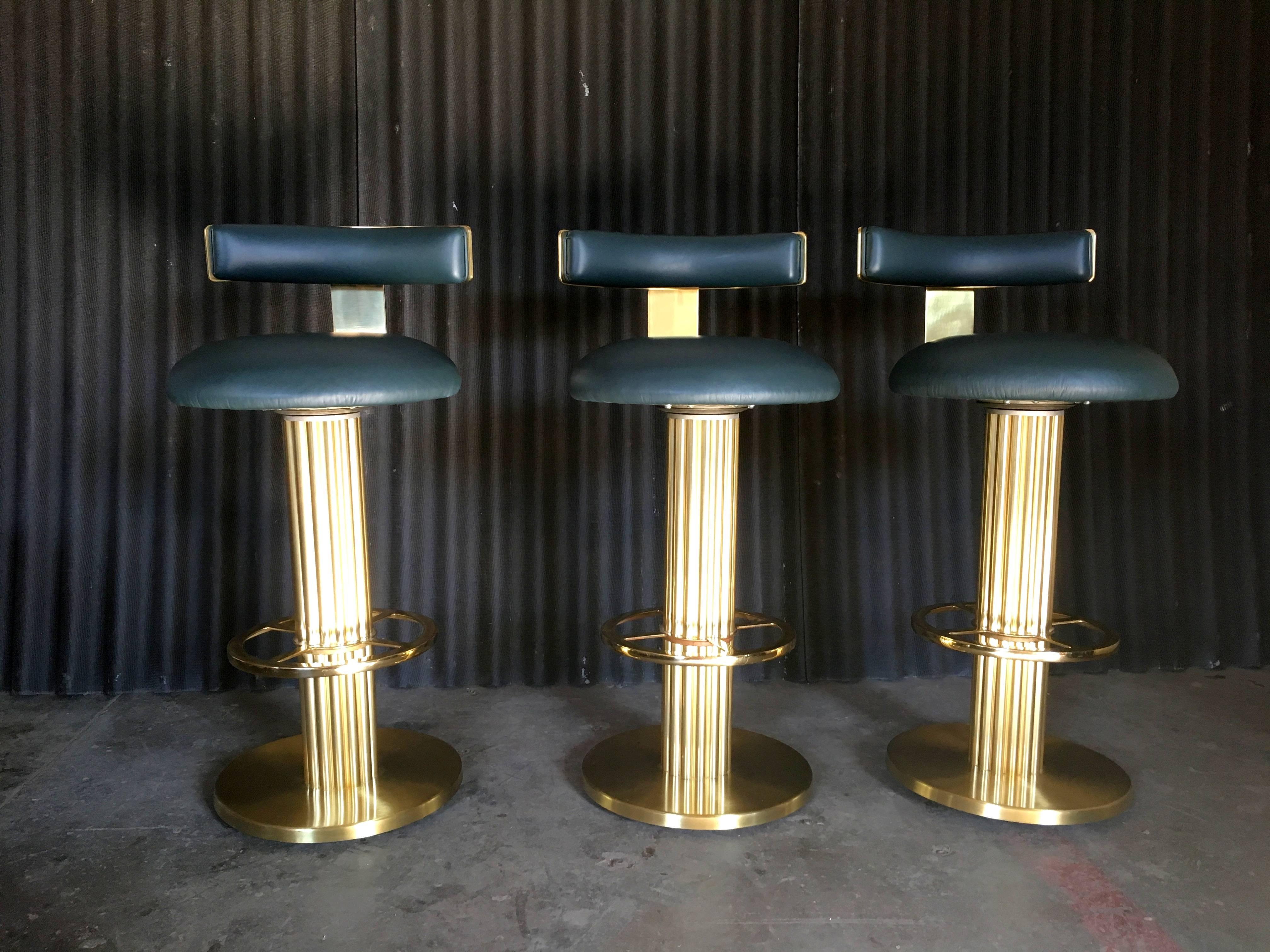 You will not find a more gorgeous set of brass-plated design for Leisure bar stools out there. These pretty babies are near perfection!
No rips or holes in the blue/green leather and only slight marks on the brass as shown in the two photos. Other