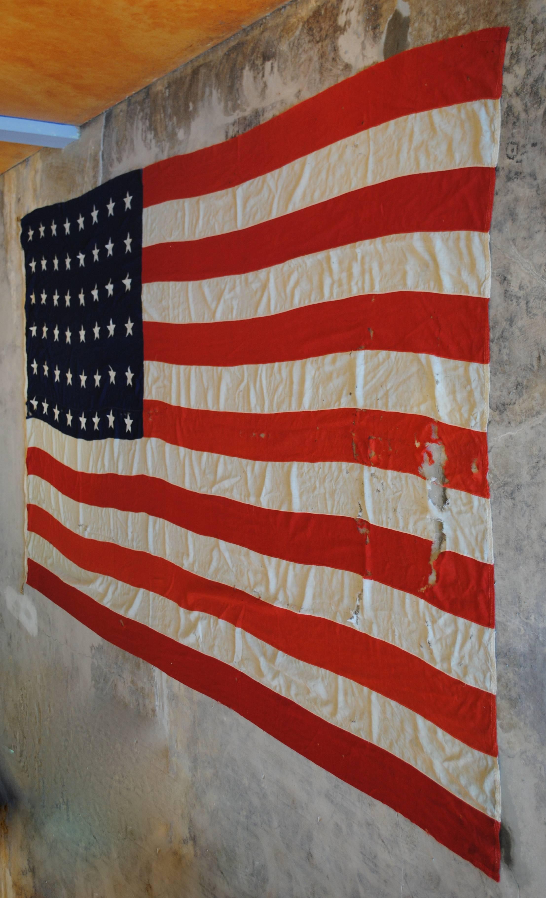Enormous early American flag. 48 sewn stars. Color still vibrant.