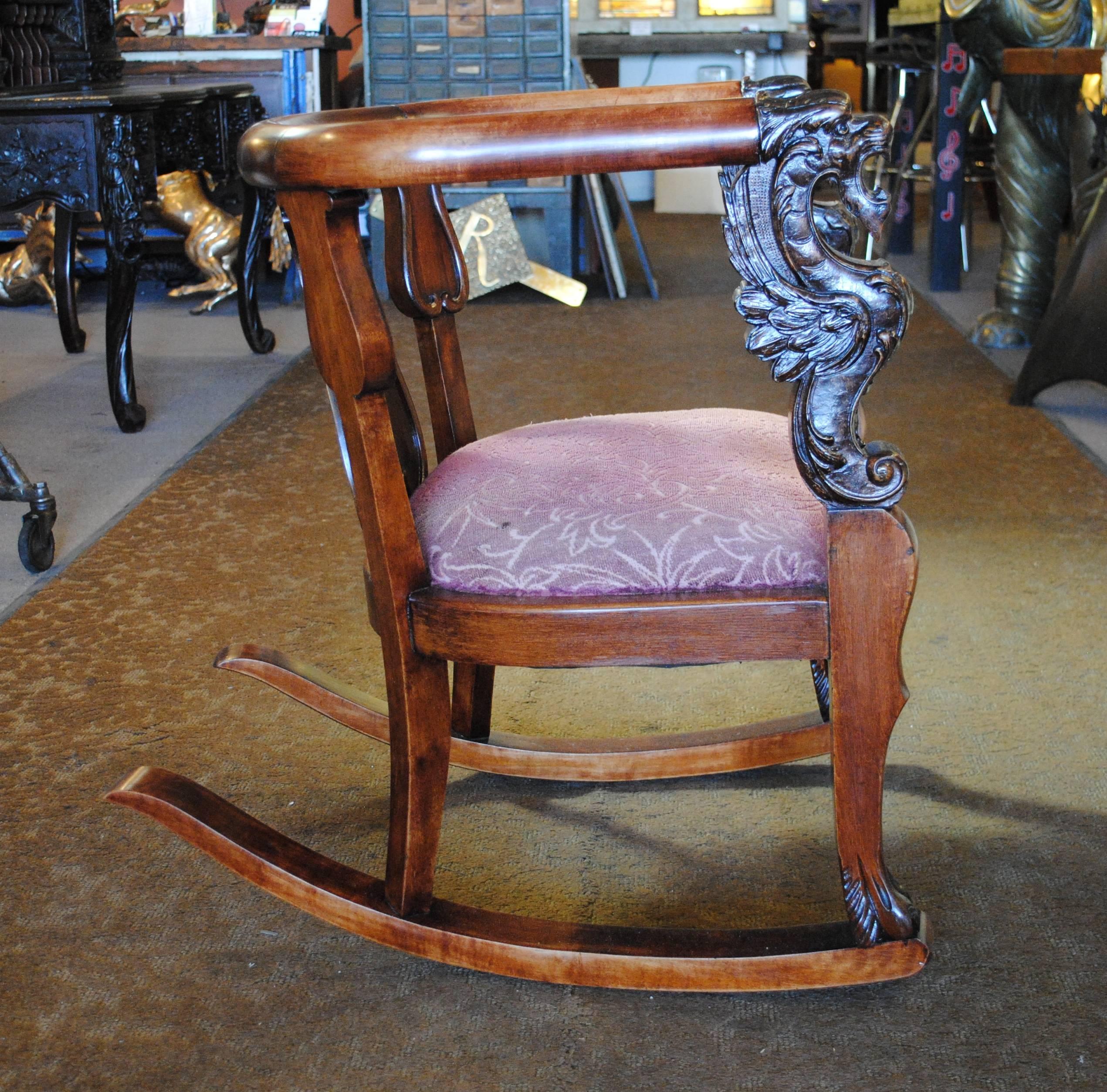 antique lion head rocking chair