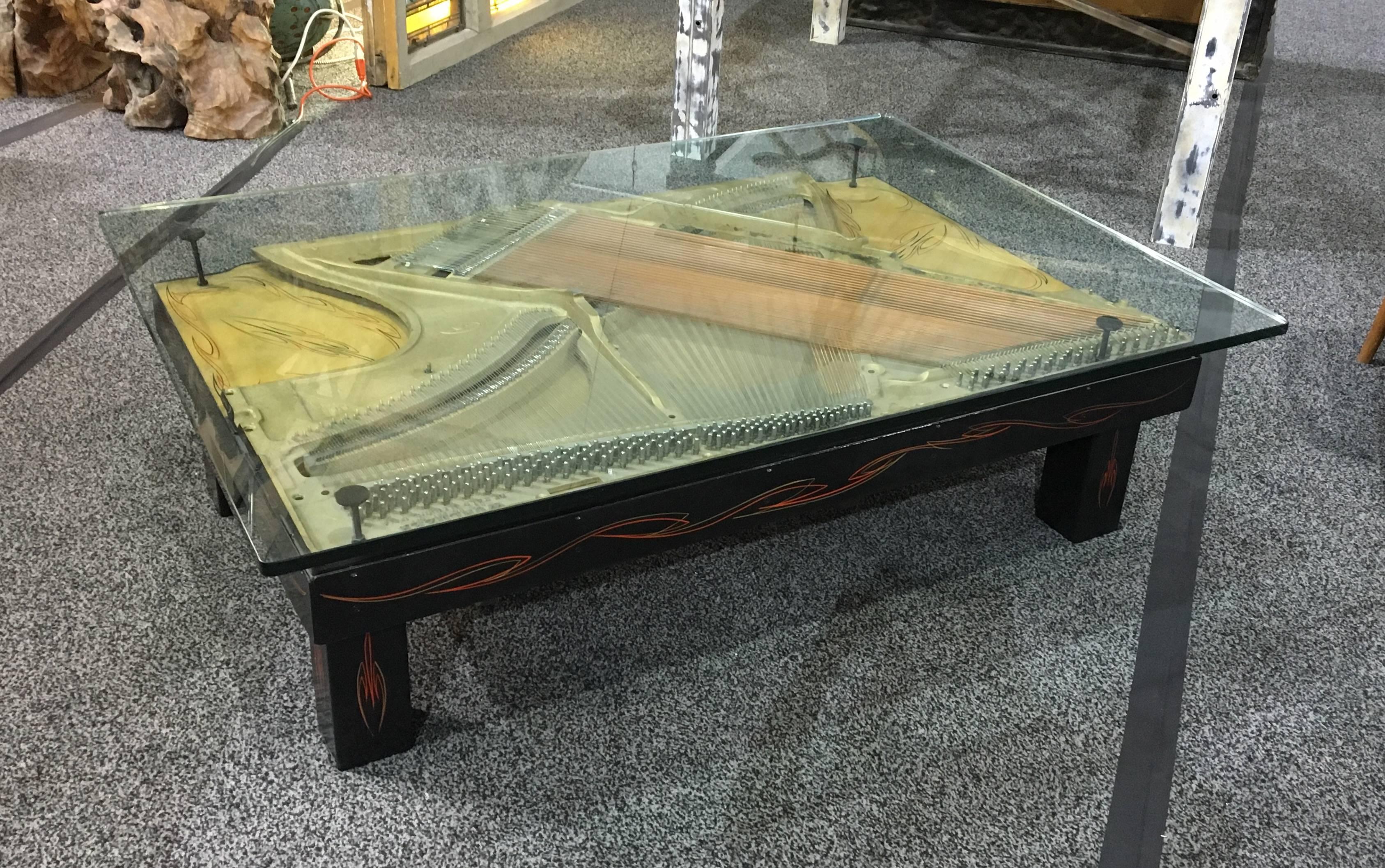 This custom designed table was made using the beautiful vintage harp from a Wurlitzer piano and has been tastefully pinstriped.
