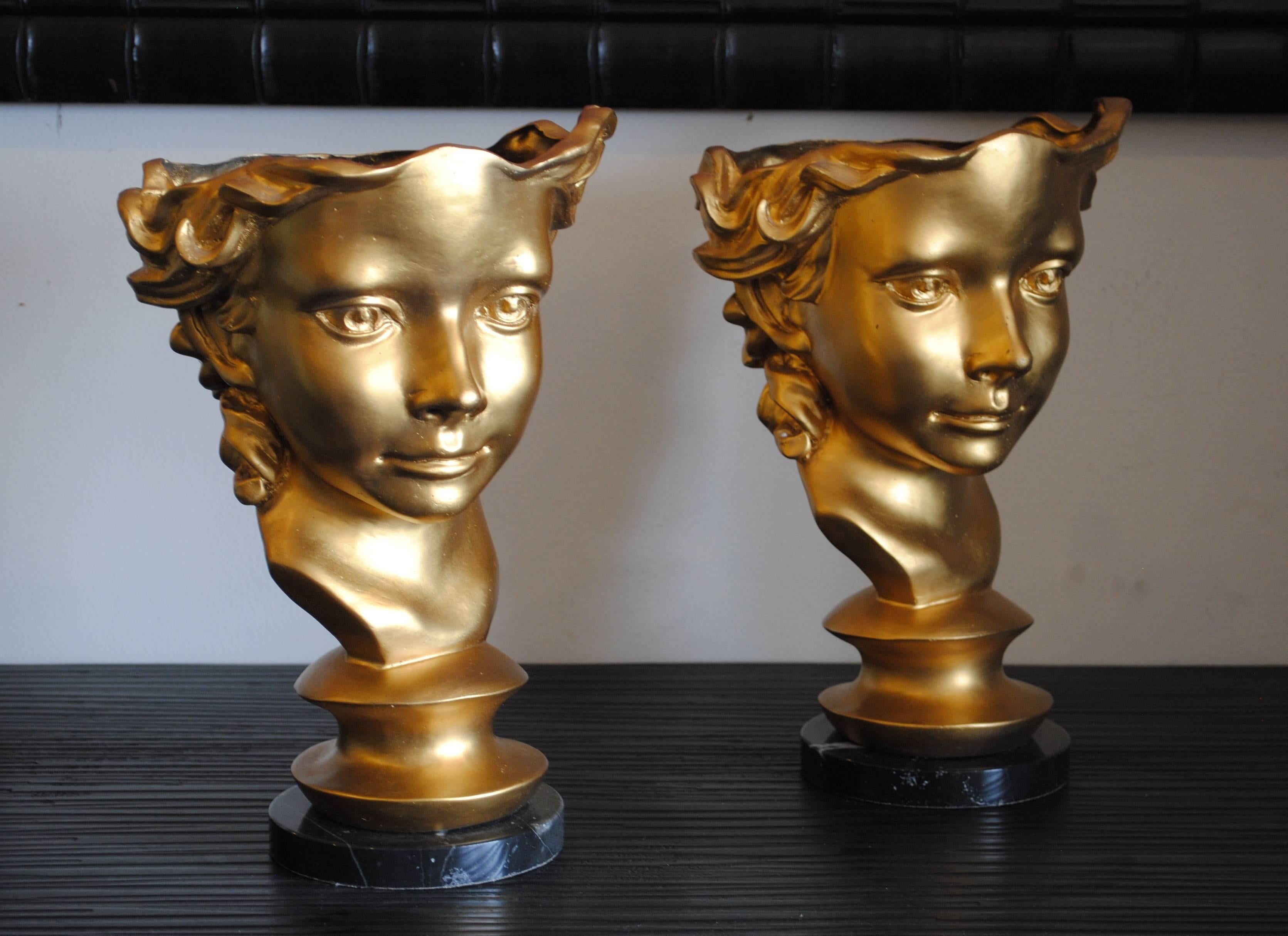 Pair of gilt bronze busts on marble bases.