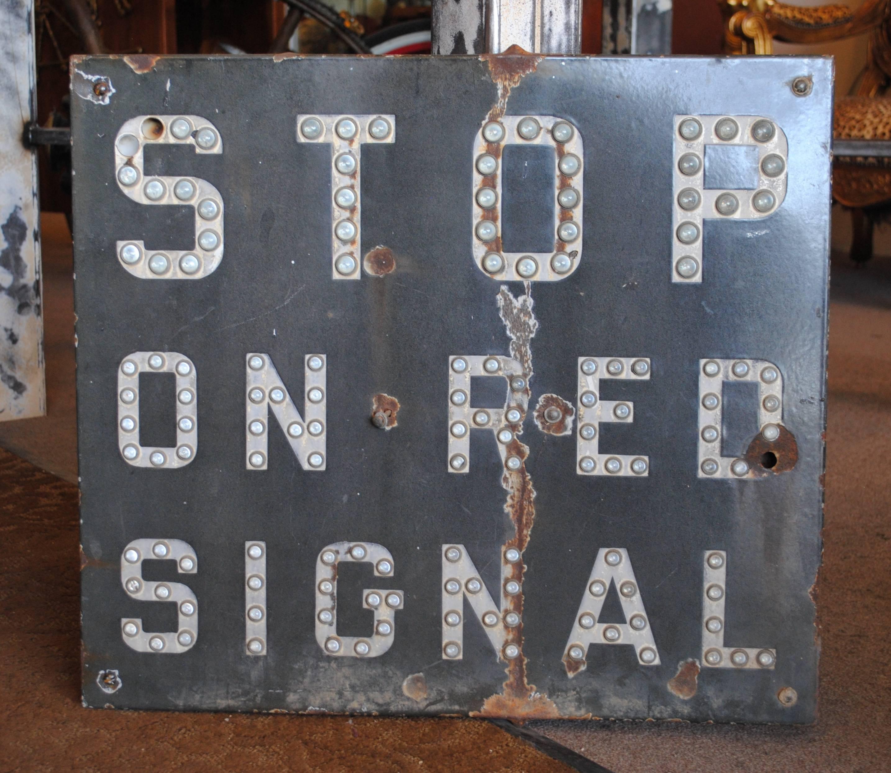 Vintage railroad STOP ON RED SIGNAL sign with glass marble reflectors. The sign has great patina and old worn paint. It displays very well.