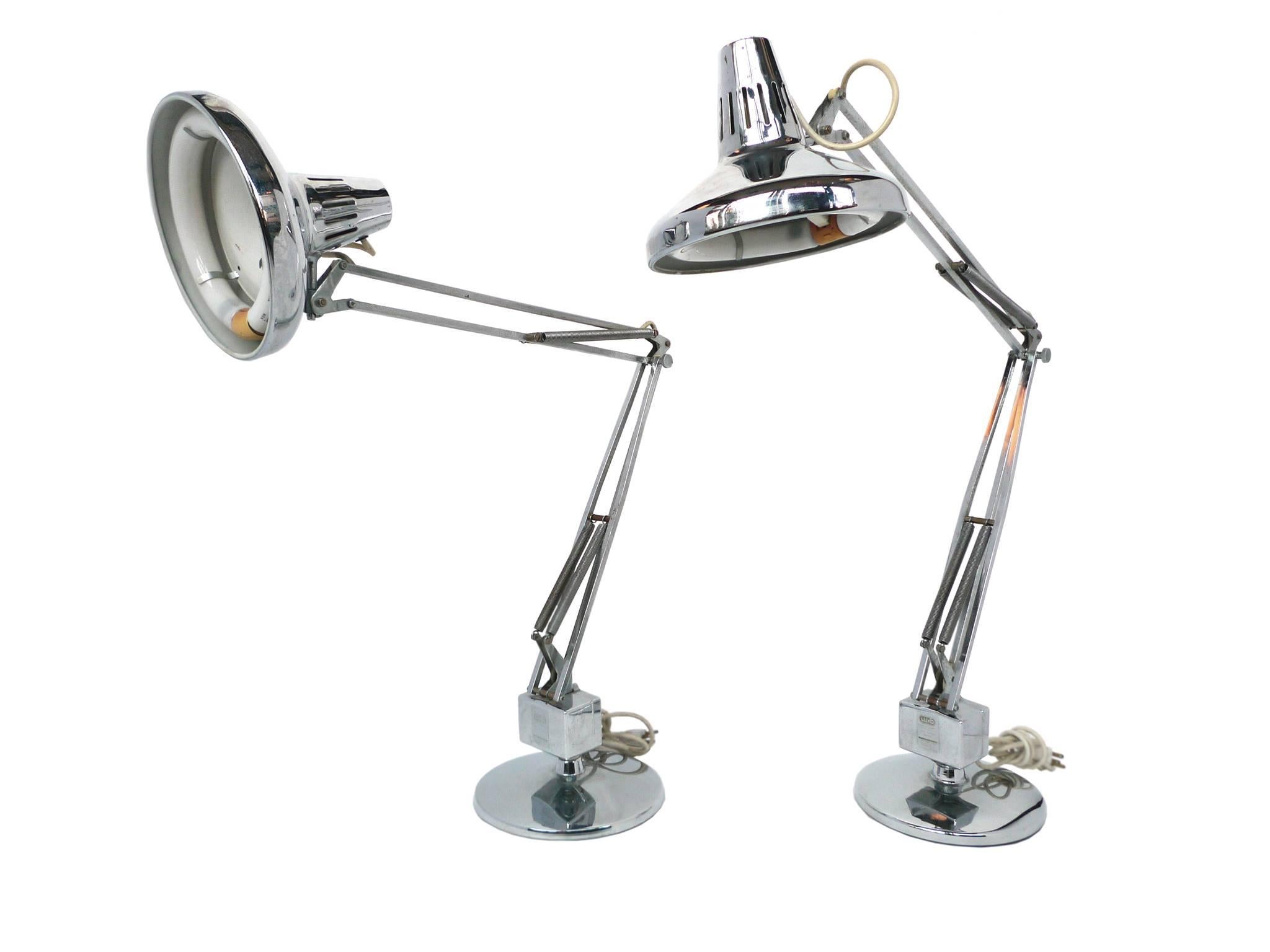 These iconic Luxo chrome desk lamps are articulated and can be adjusted in height and length. They also rotate at the base. 

Note that the measurements listed indicate the diameter of the base (9 inches) and the height of each lamp at its most