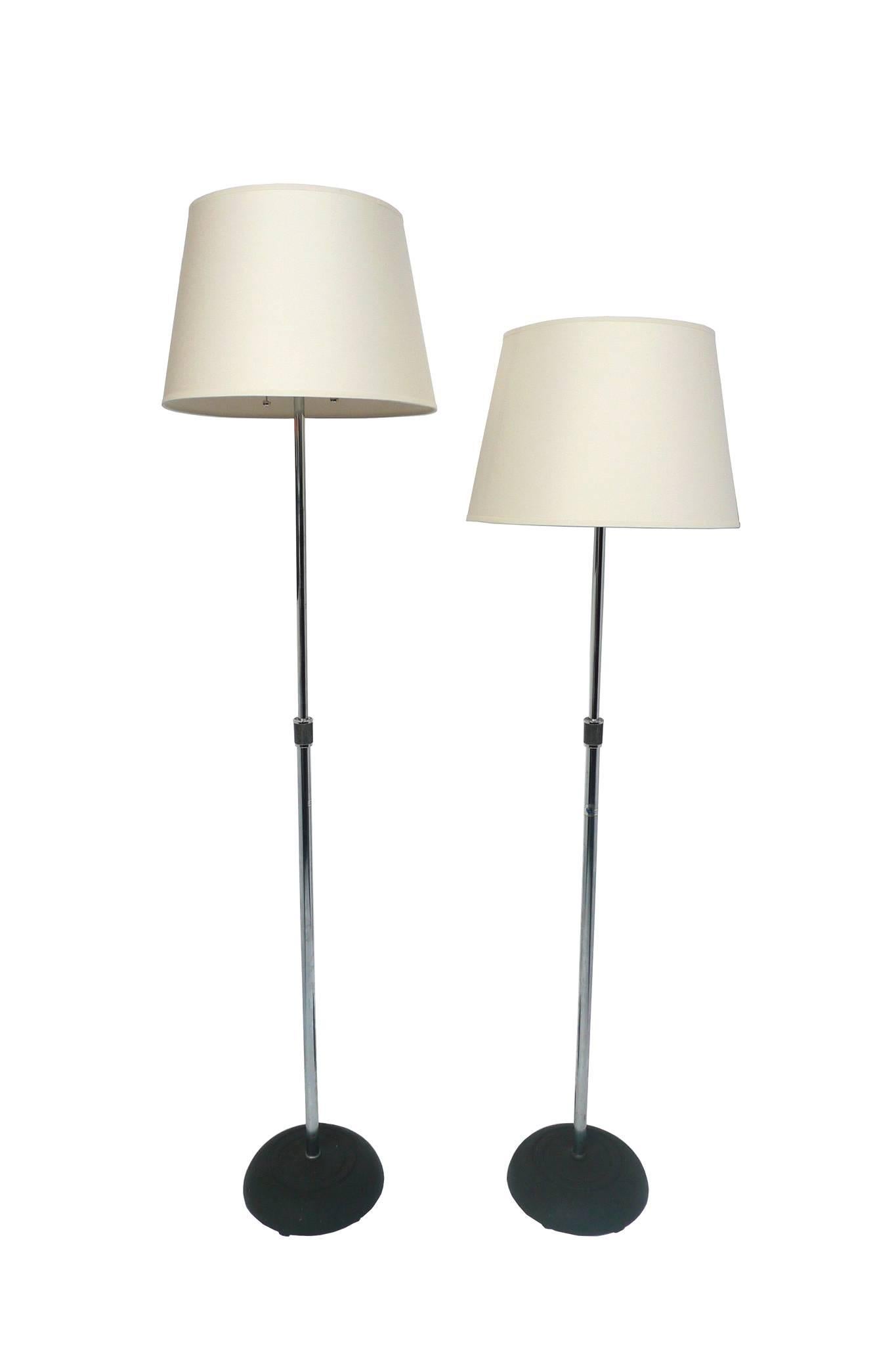 These custom-made lamps consist of converted chrome Atlas mic stands with cast-iron bases. They've been paired with new parchment shades, whose pulpy texture makes a beautiful contrast against the chrome's sheen. The stands can be adjusted at the