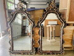 Early 20th Century Italian Carved Giltwood Wall Mirrors - A Pair