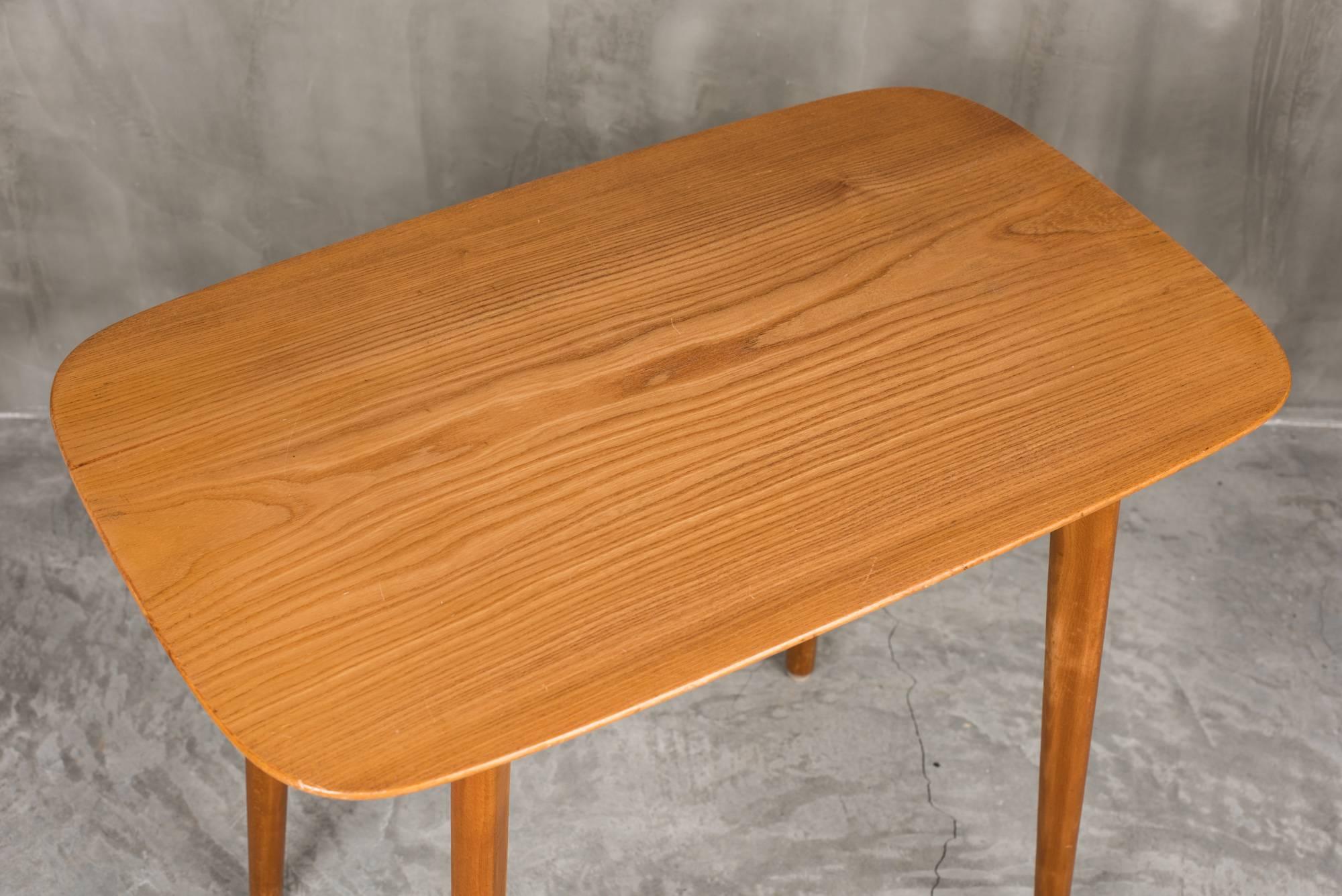 This little retro side table or coffee table is synonymous with the 1960s. Splayed and tapering legs, rounded corners. Perfect as an occasional table, being light it can be moved easily around a room. We found it in Sweden.