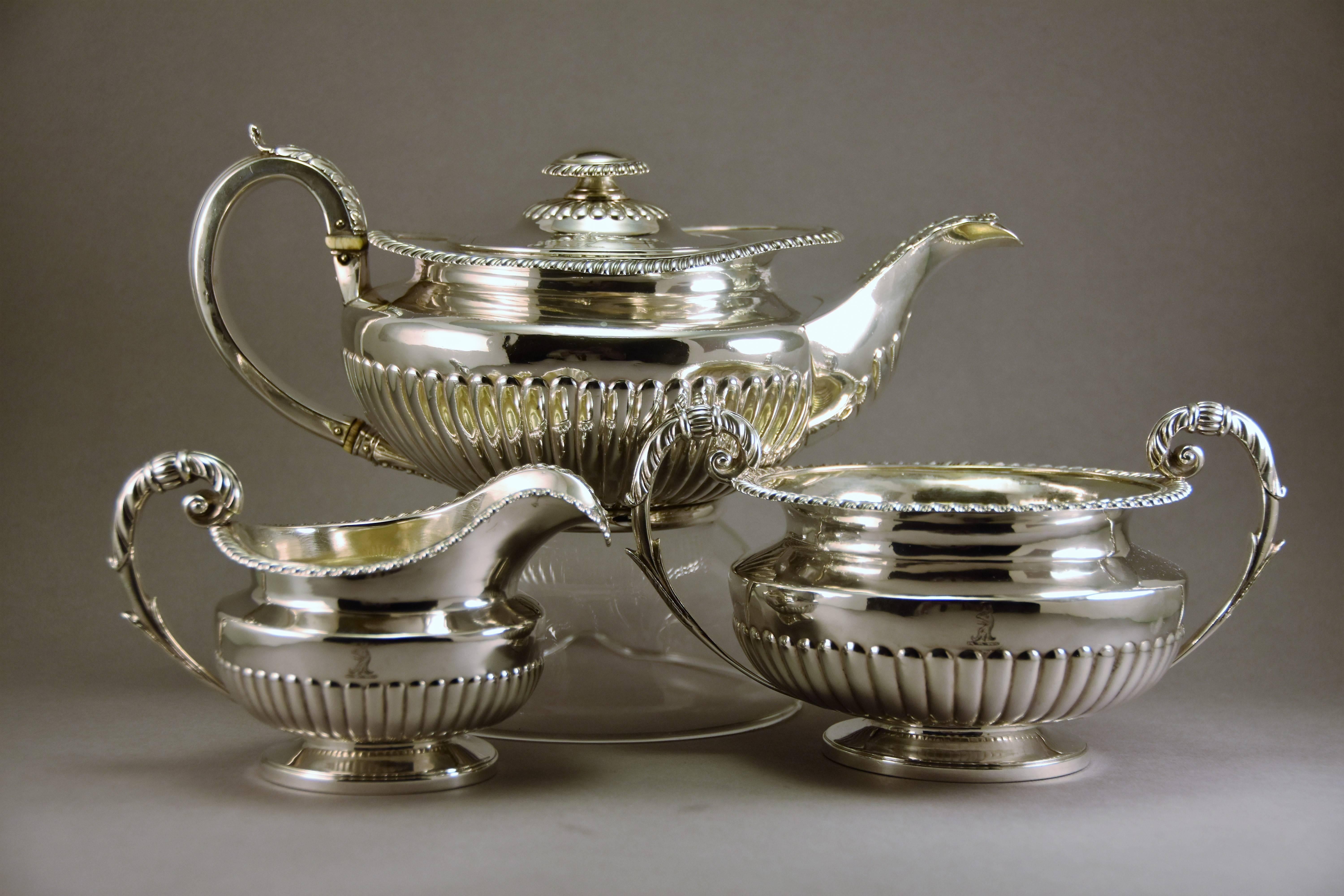 A superb quality, three-piece, George IV sterling silver tea set made in London by Rebecca Emes and Edward Barnard hallmarked and dated 1823

Compressed circular design, with prow lip, half reeded, beneath scallop shell rims and acanthus leaves.
