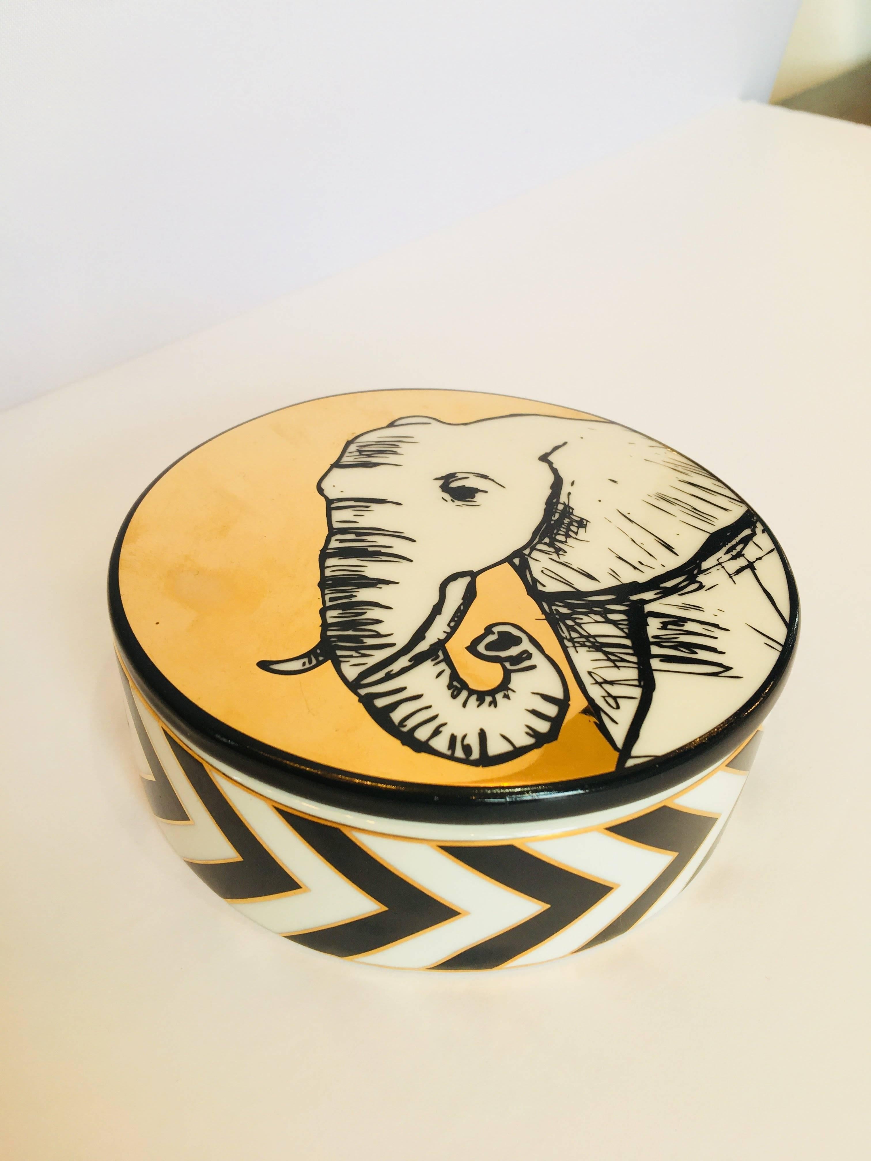 Handmade Jonathan Adler round trinket elephant box.