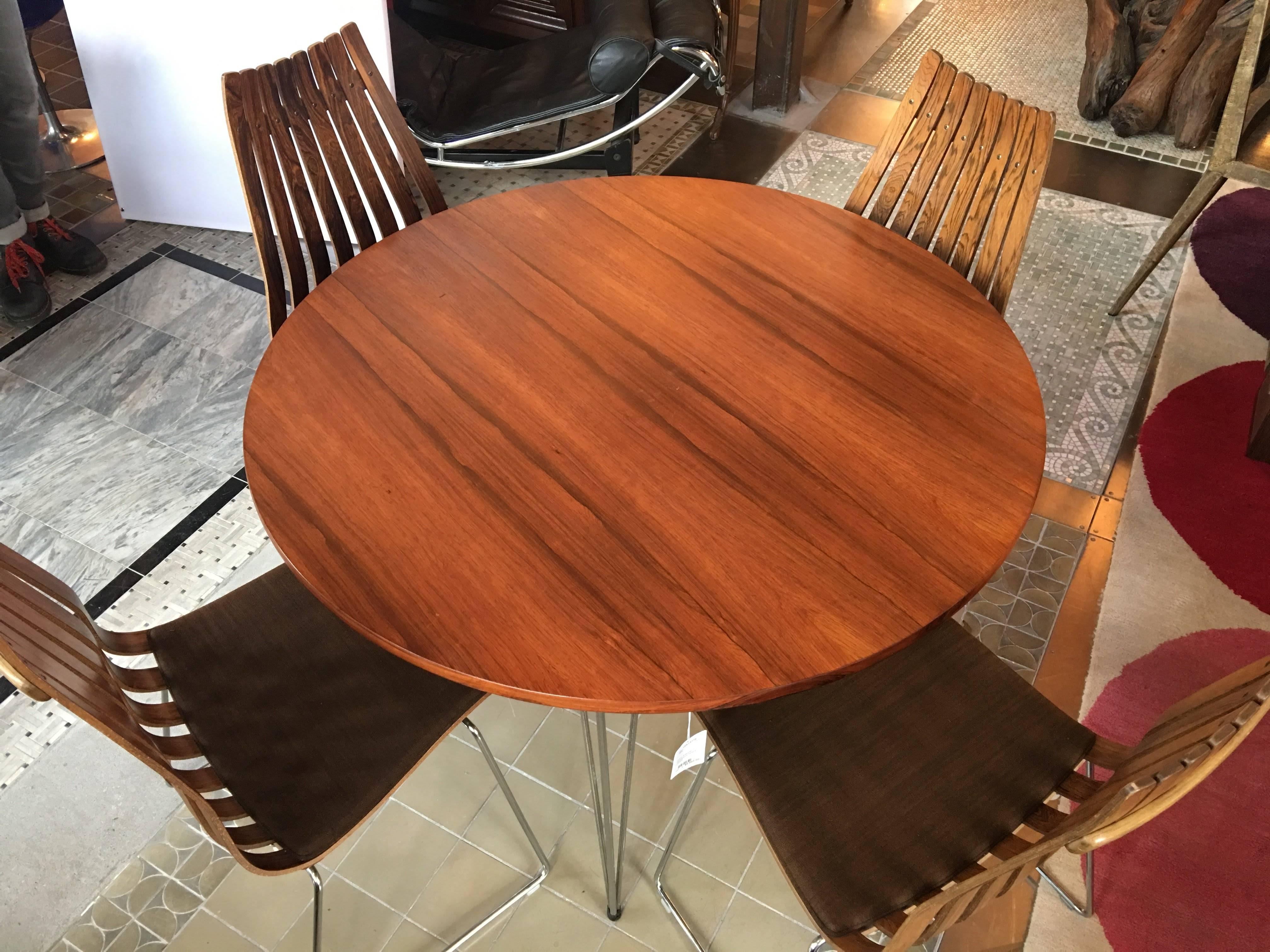Hans Brattrud rosewood table and four chairs.