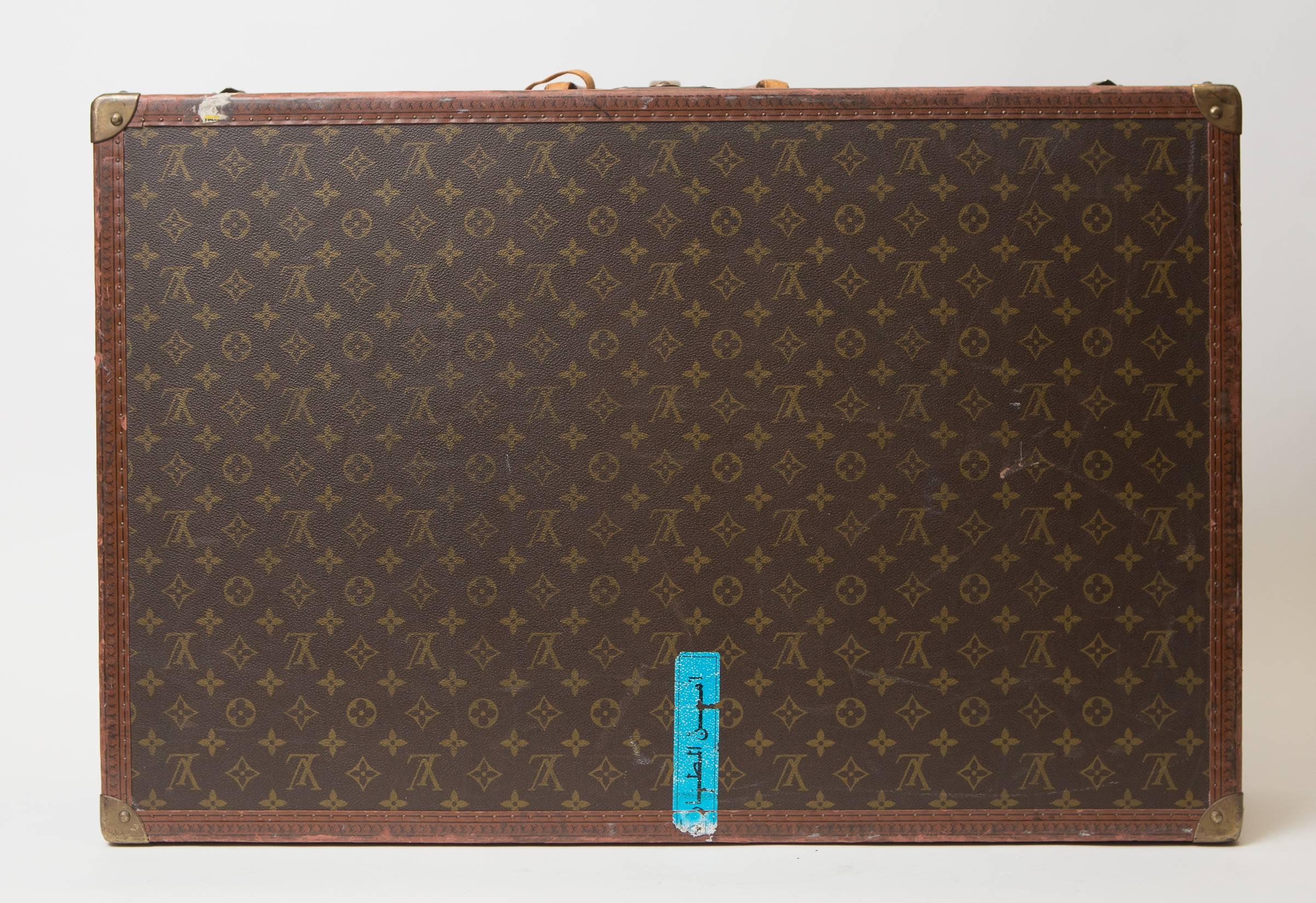 Louis Vuitton Alzar 80 monogram hardside suitcase/trunk, the largest of the Alzar line. Trunk originally retails at $8,900.