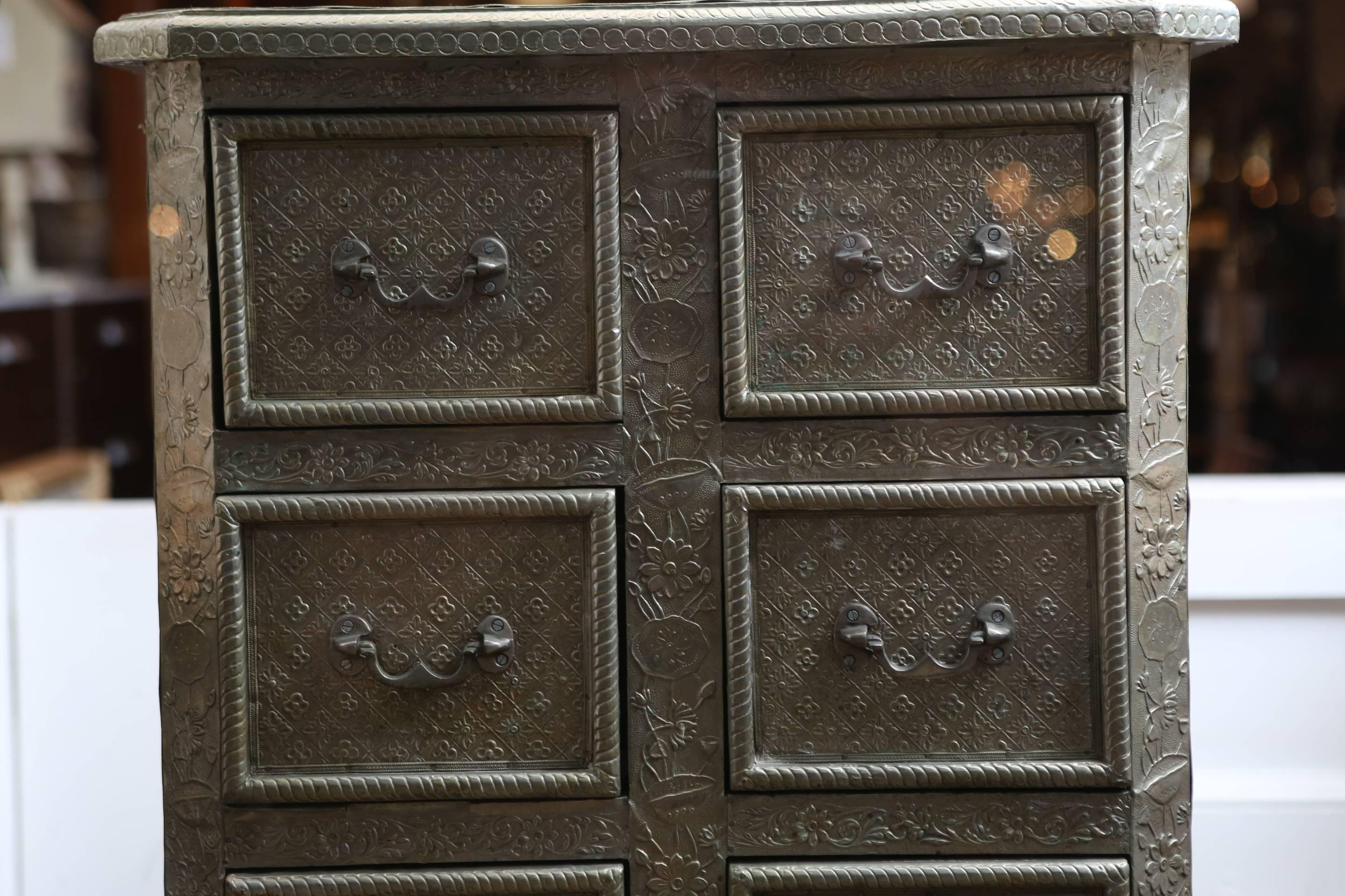 A lovely rare Victorian pressed tin cabinet with floral pattern. Has a wonderful aged patina. Originally bought at auction for $1,400.